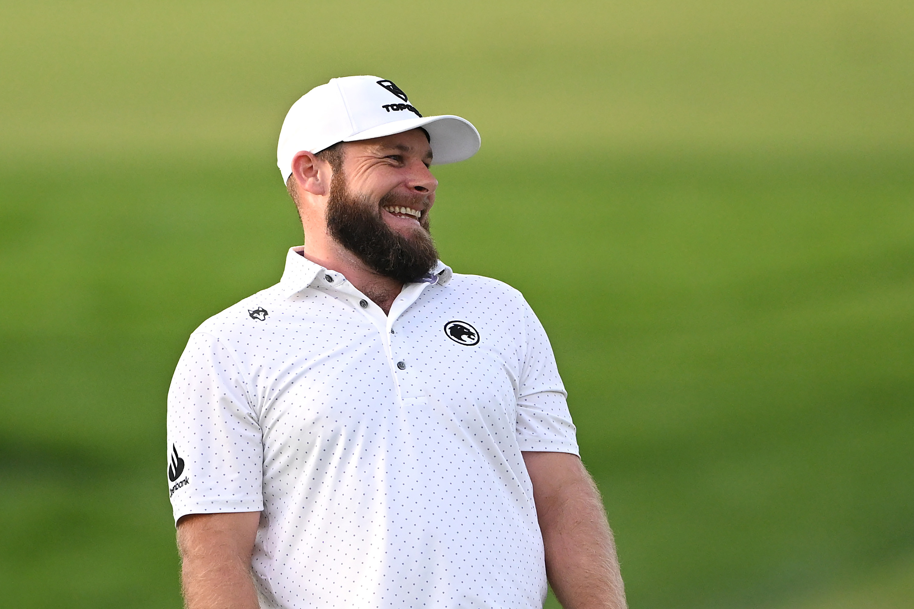 Tyrrell Hatton of England celebrates after chipping in for eagle on the 17th hole during day two of the Hero Dubai Desert Classic 2026 at Emirates Golf Club on January 23, 2026 in Dubai, United Arab Emirates. (Photo by Ross Kinnaird/Getty Images)