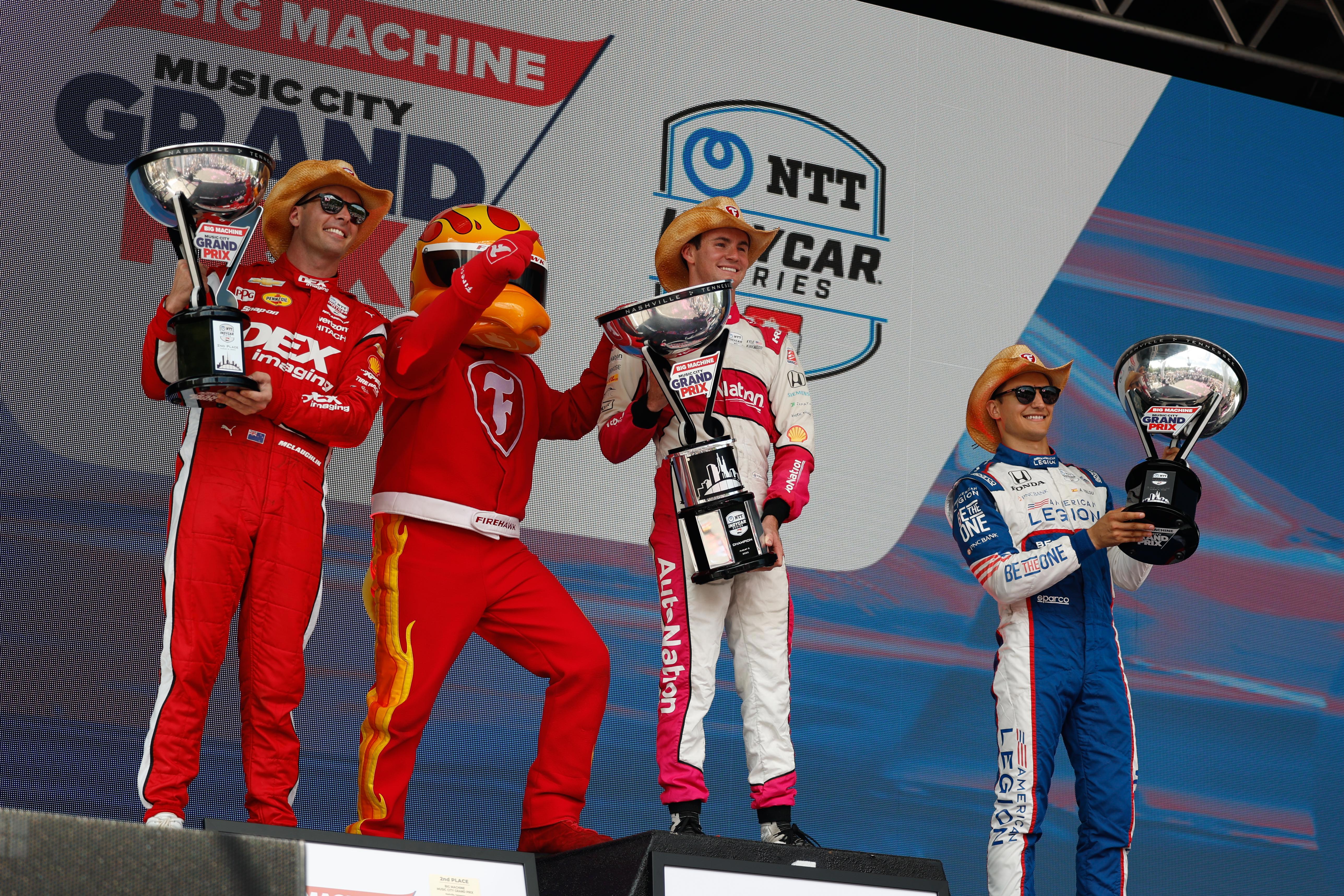 Scott McLaughlin (left) with Kyle Kirkwood and Alex Palou on the Music City Grand Prix podium.