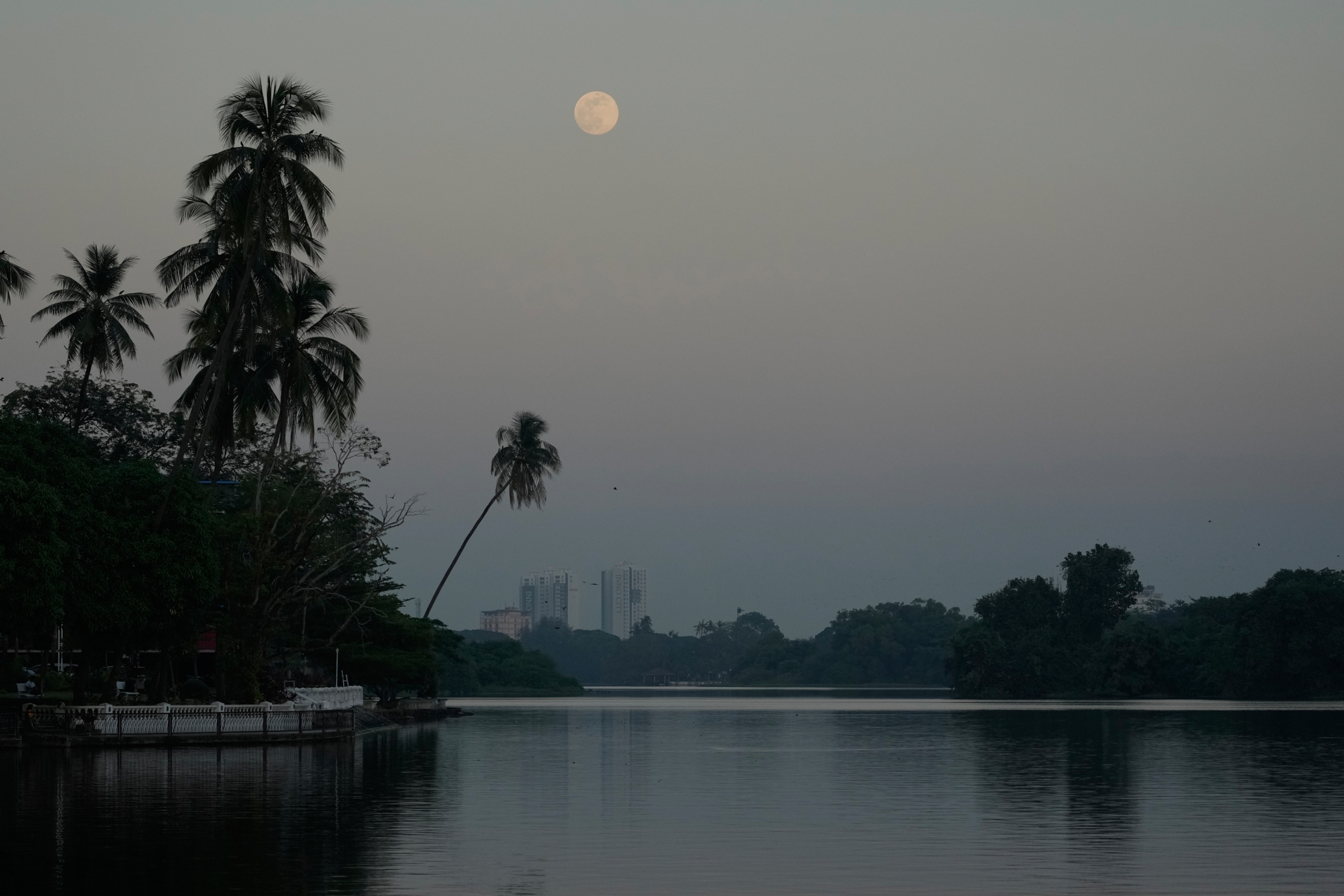 The moon rising near Inya Lake is seen Thursday, Dec.4, 2025, in Yangon, Myanmar.