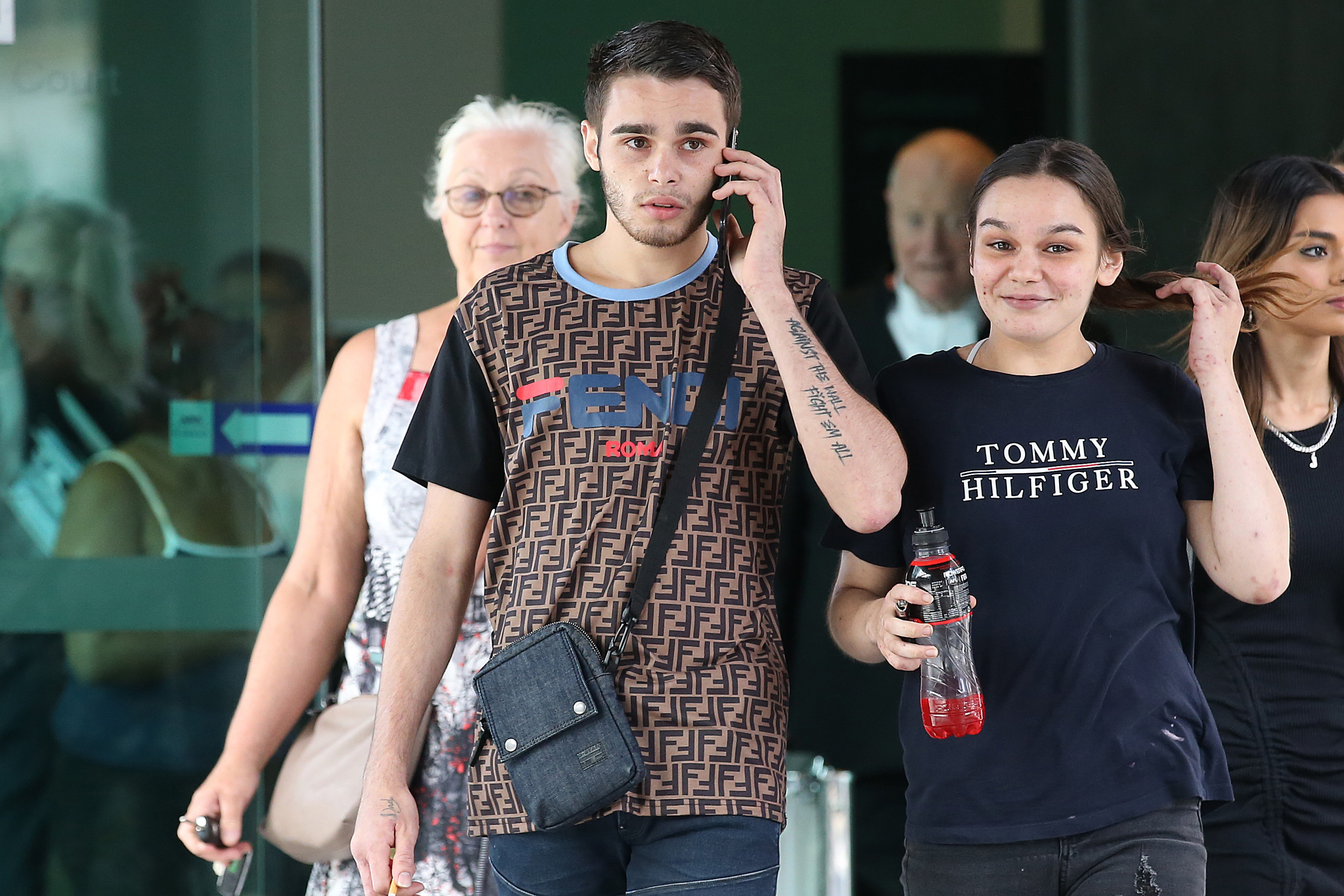 Joshua Elkerton-Sandy (Left) leaves the Brisbane Magistrate's Court, in Brisbane, Saturday, August 22, 2020. Joshua Elkerton-Sandy is facing a committal hearing in Brisbane Magistrates Court after being charged over the death of Kane Alexanderson last year. (AAP Image/Jono Searle) NO ARCHIVING