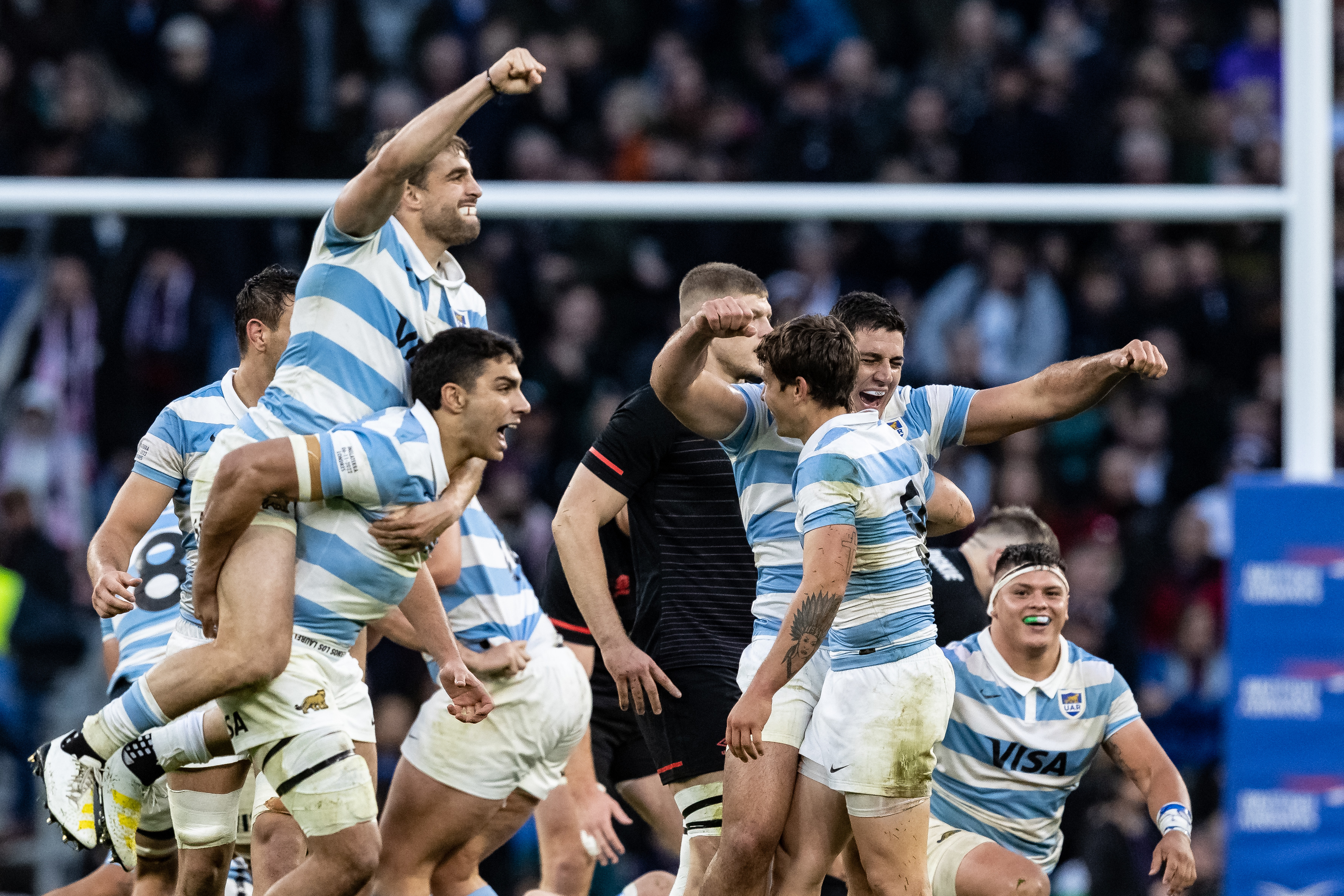 Argentina players celebrate victory at the end of the match during the Autumn International match against England at Twickenham Stadium.