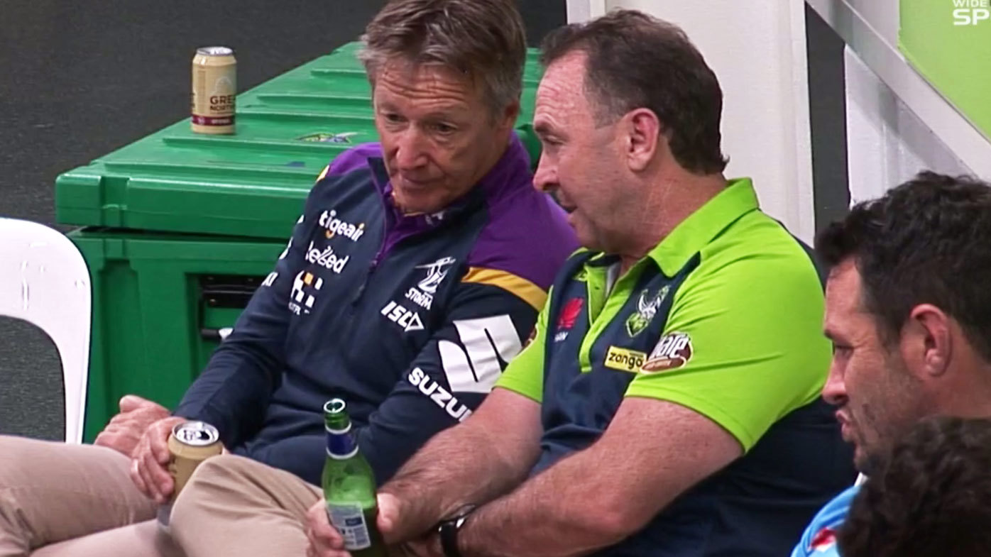 Craig Bellamy and Ricky Stuart share a heartwarming moment following their preliminary final clash. (Nine)