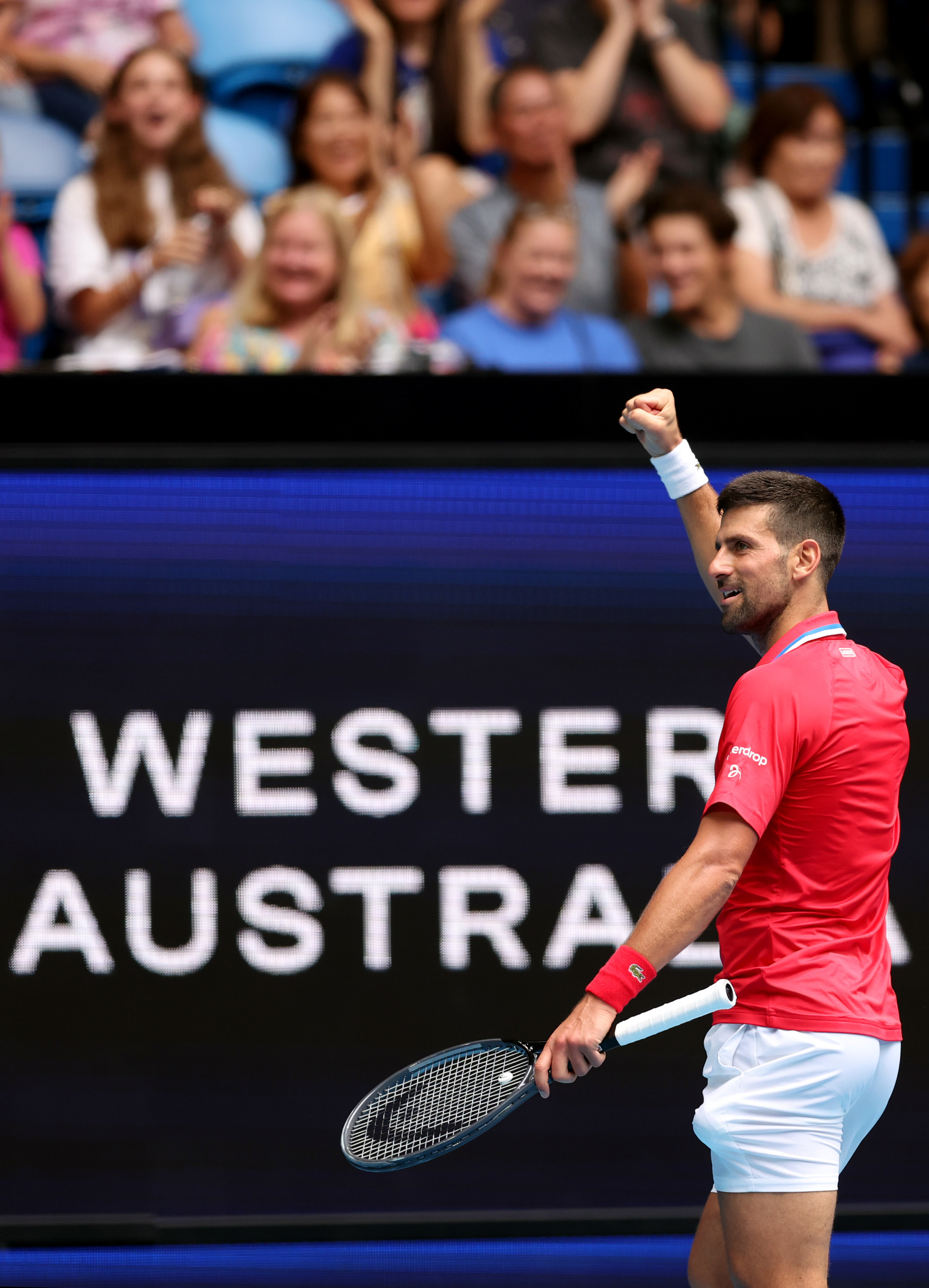 Novak Djokovic of Team Serbia fires up the crowd in Sydney.