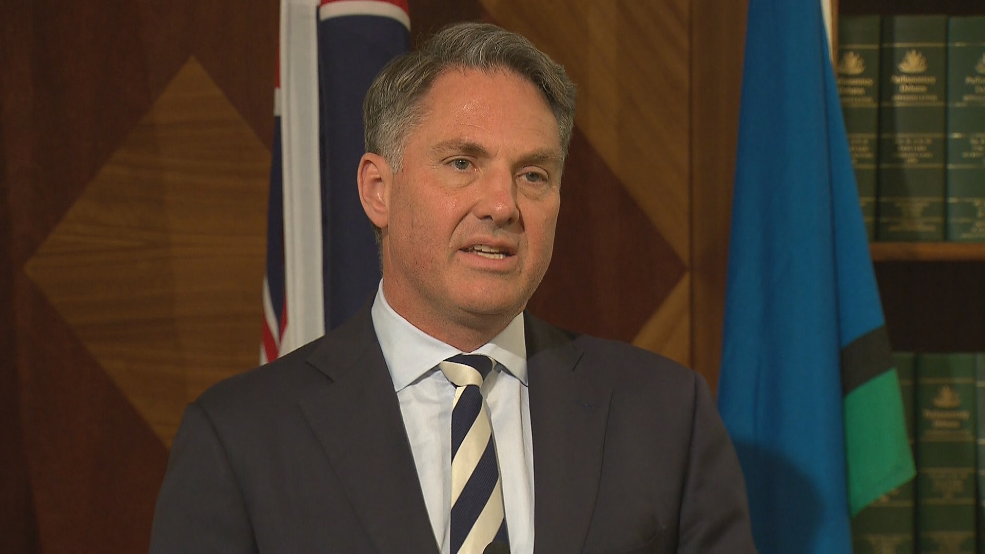 Deputy Prime Minister Richard Marles says the new government is looking into whether the former prime minister's office sent an election day text about an asylum seeker boat.