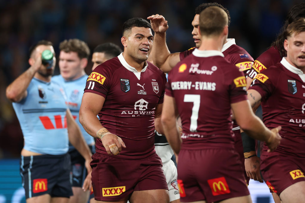 David Fifita celebrates with team mates after scoring a try.