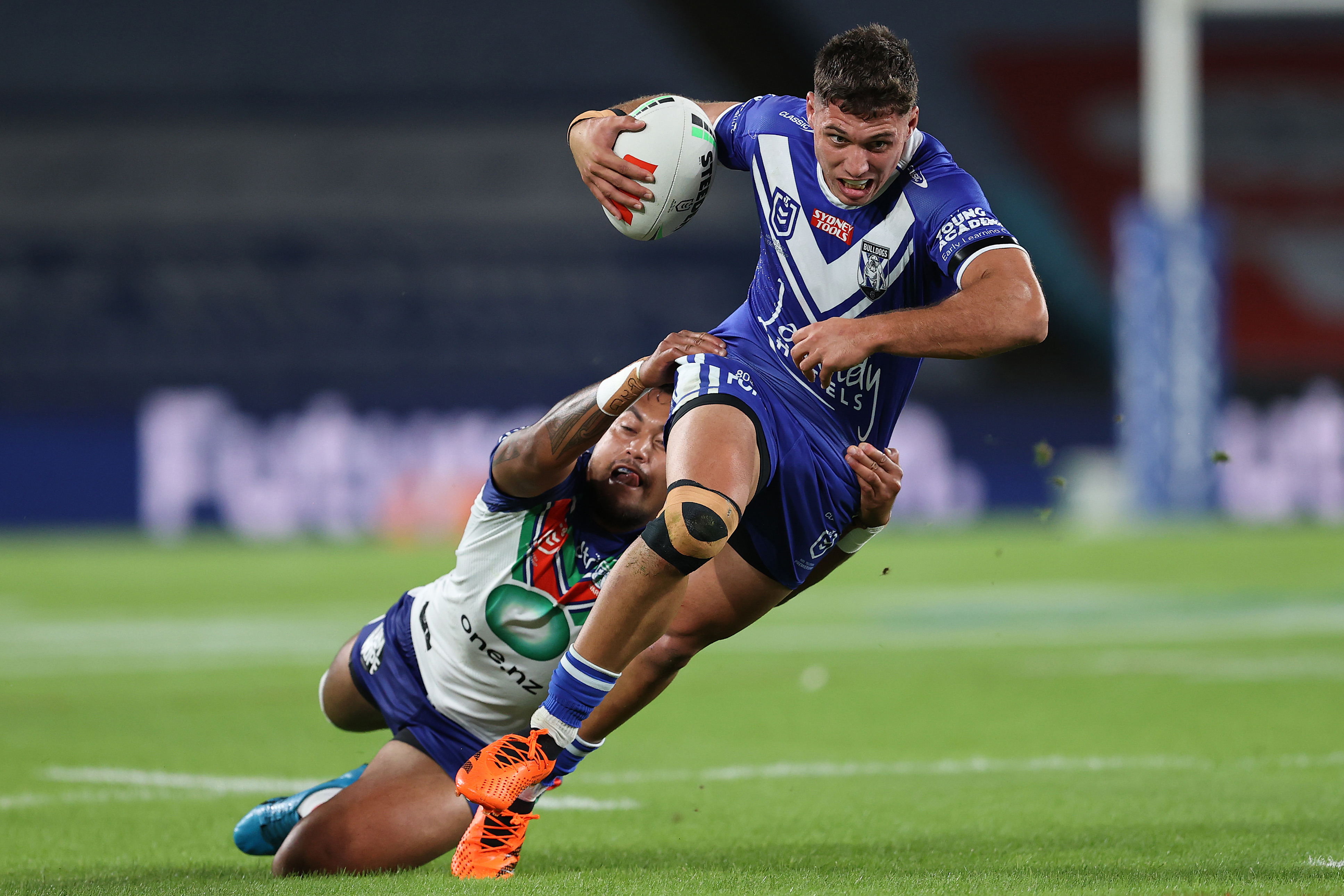 SYDNEY, AUSTRALIA - MAY 12:  Jake Averillo of the Bulldogs is tackled during the round 11 NRL match between Canterbury Bulldogs and New Zealand Warriors at Accor Stadium on May 12, 2023 in Sydney, Australia. (Photo by Brendon Thorne/Getty Images)