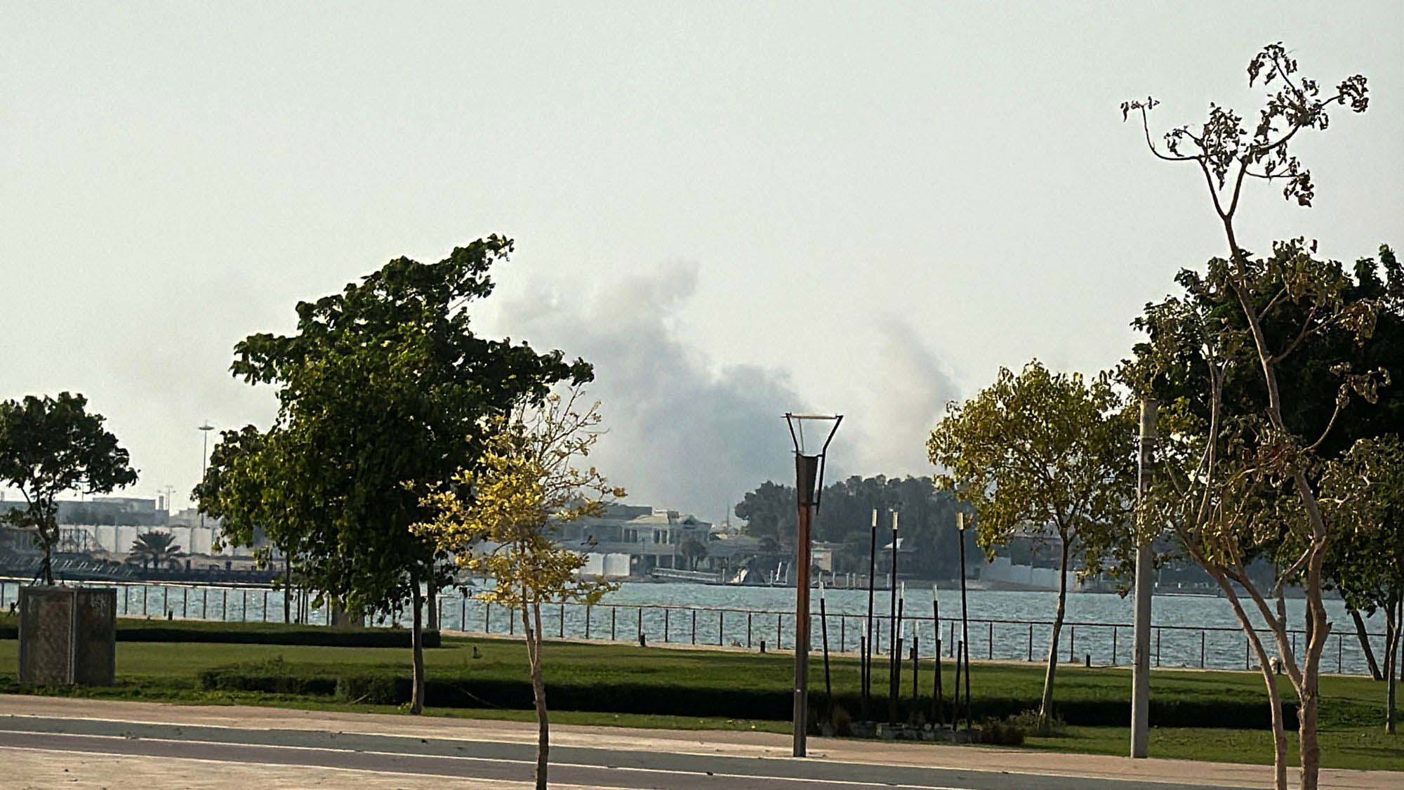 Smoke rises after several blasts were heard in Doha, Qatar, on Tuesday