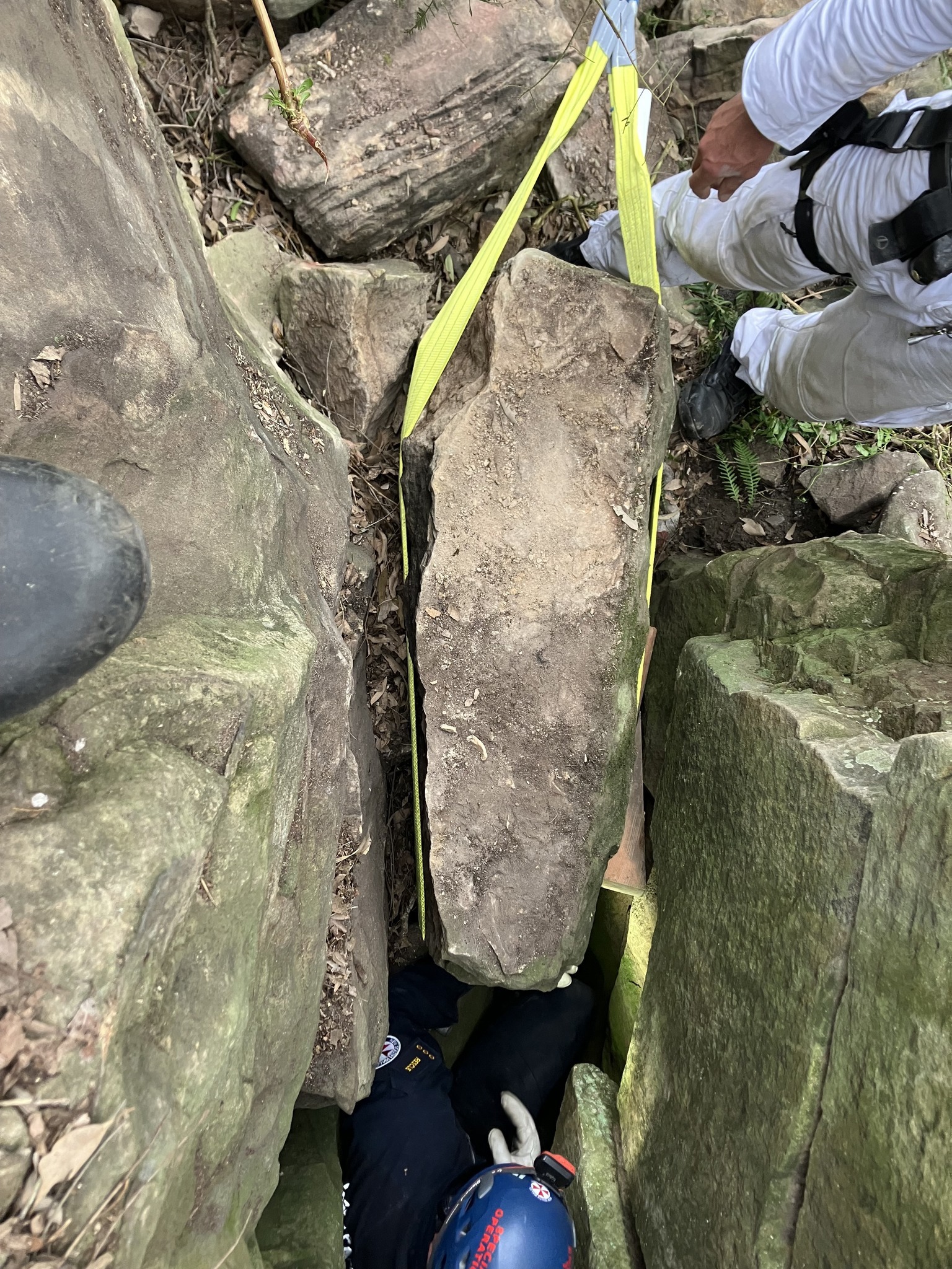 Woman stuck between two boulders in NSW