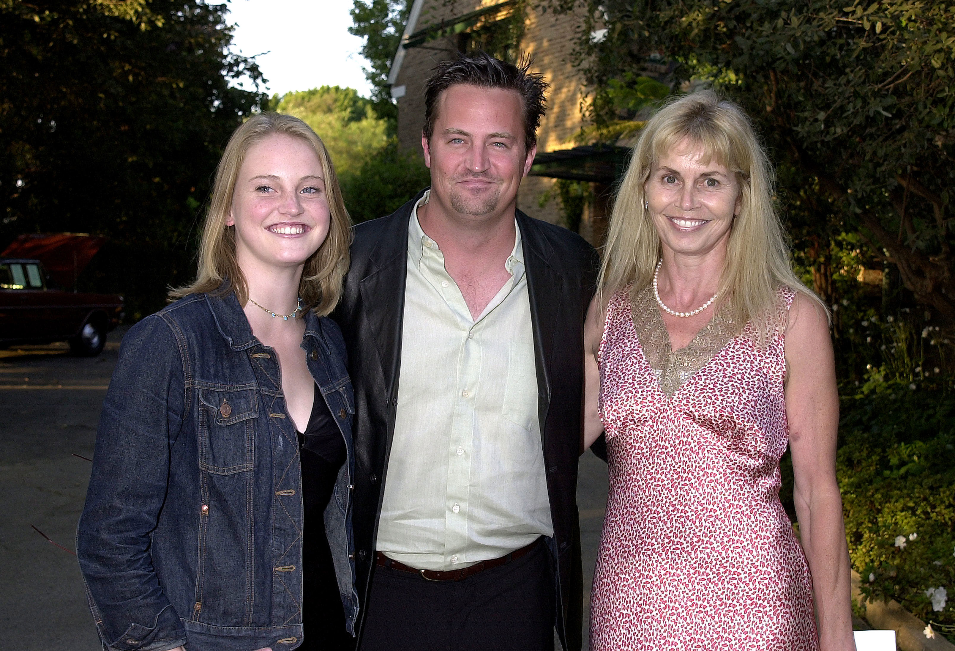 Matthew Perry with mum Suzanne and sister Emily in 2001