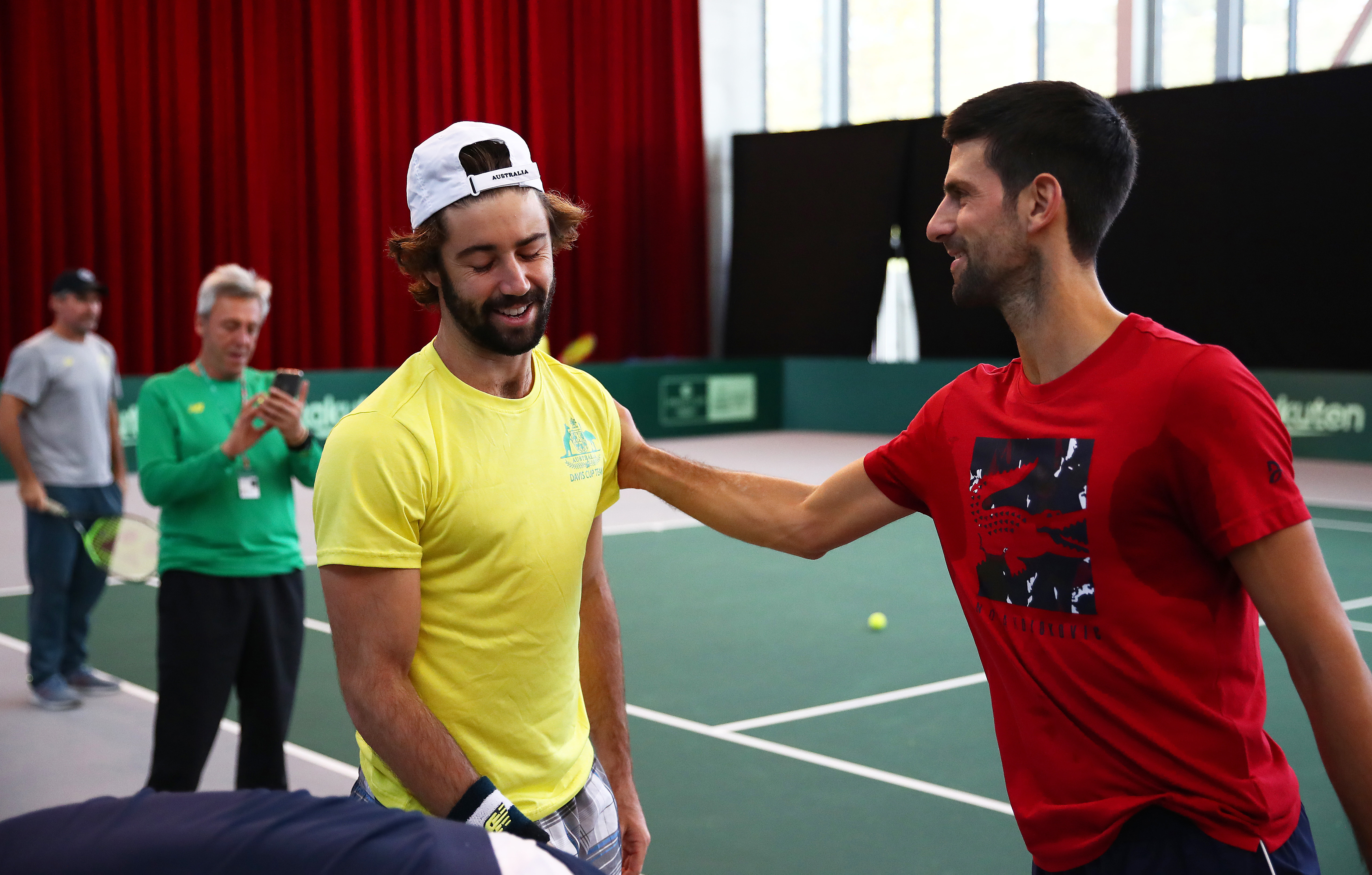 Novak Djokovic and Jordan Thompson after a Davis Cup practice session in 2019 in Madrid.