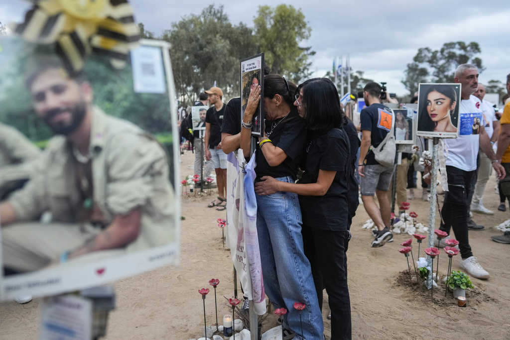 People visit the site of the Nova music festival, where hundreds of revelers were killed and abducted by Hamas and taken into Gaza