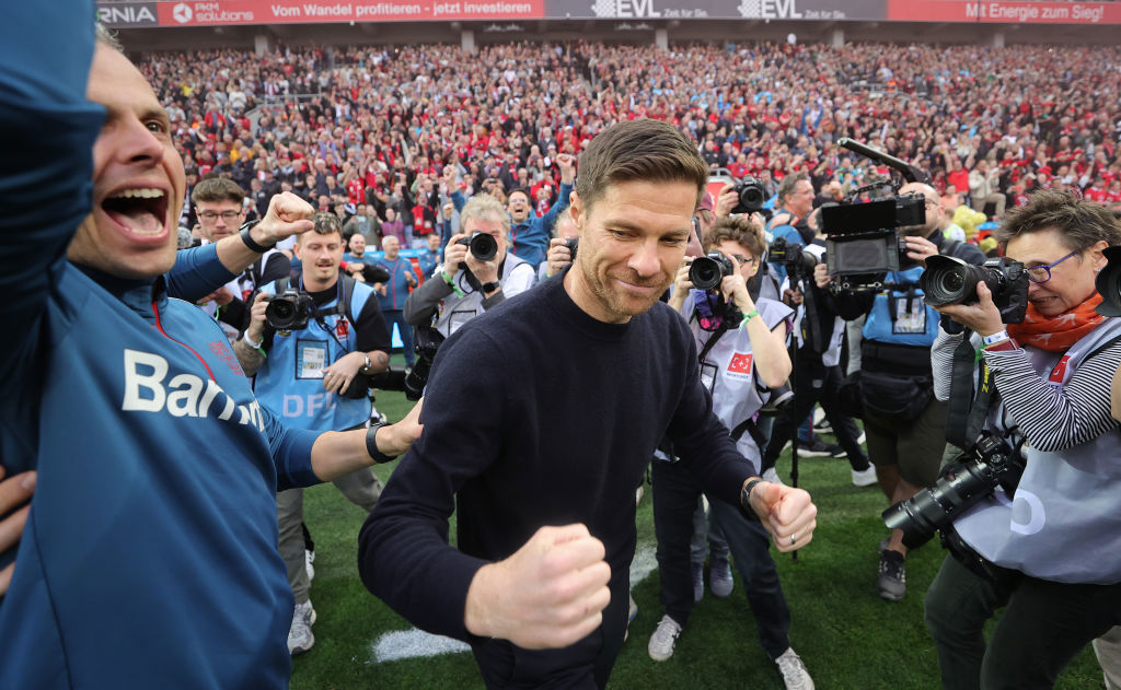 Xabi Alonso of Bayer Leverkusen celebrates the German championship.