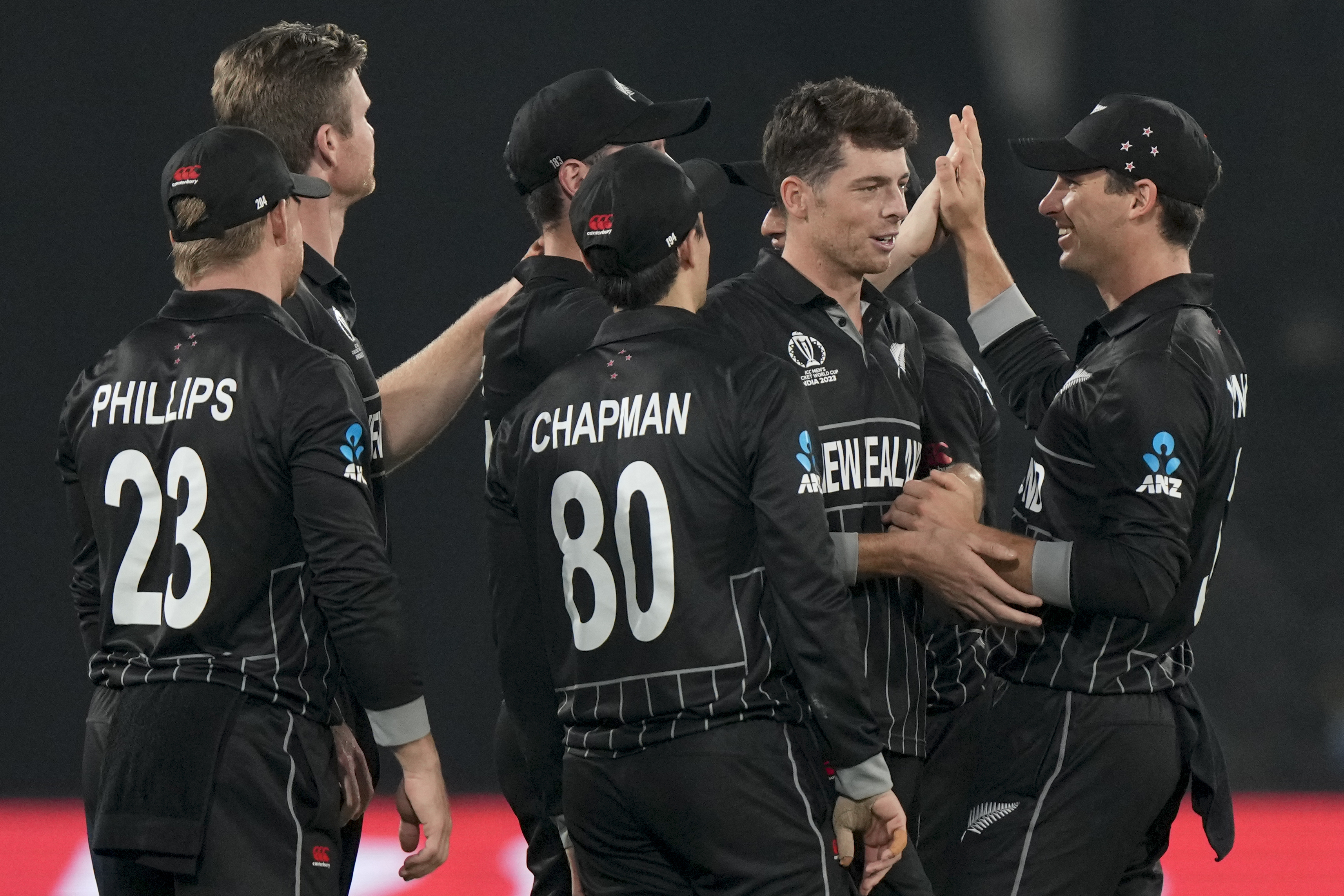 New Zealand's Mitch Santner celebrates the wicket of Netherlands' Roelof Van Der Merwe.