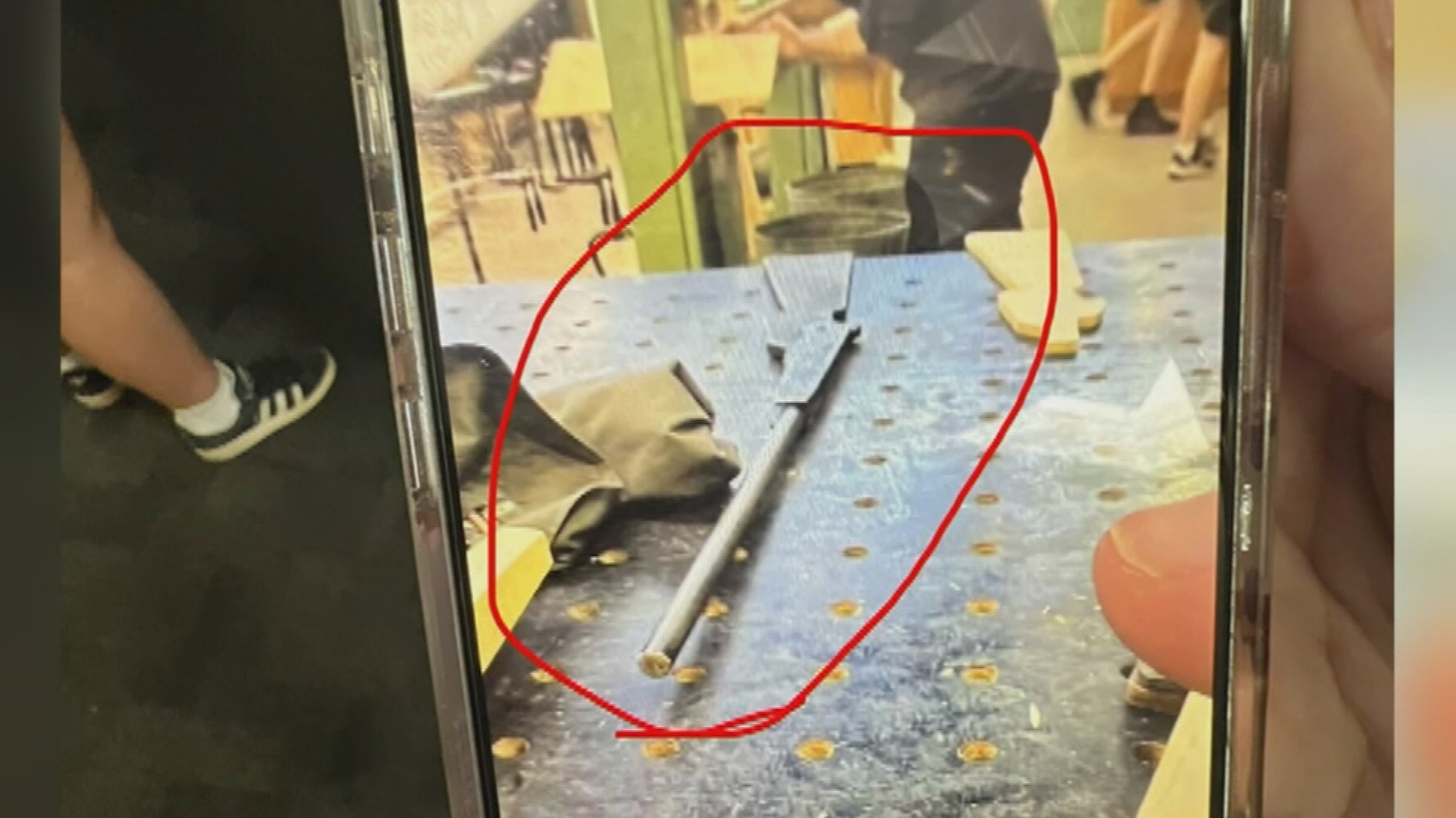 The cause of the lockdown was found to be a teacher innocently walking around with a prop gun.