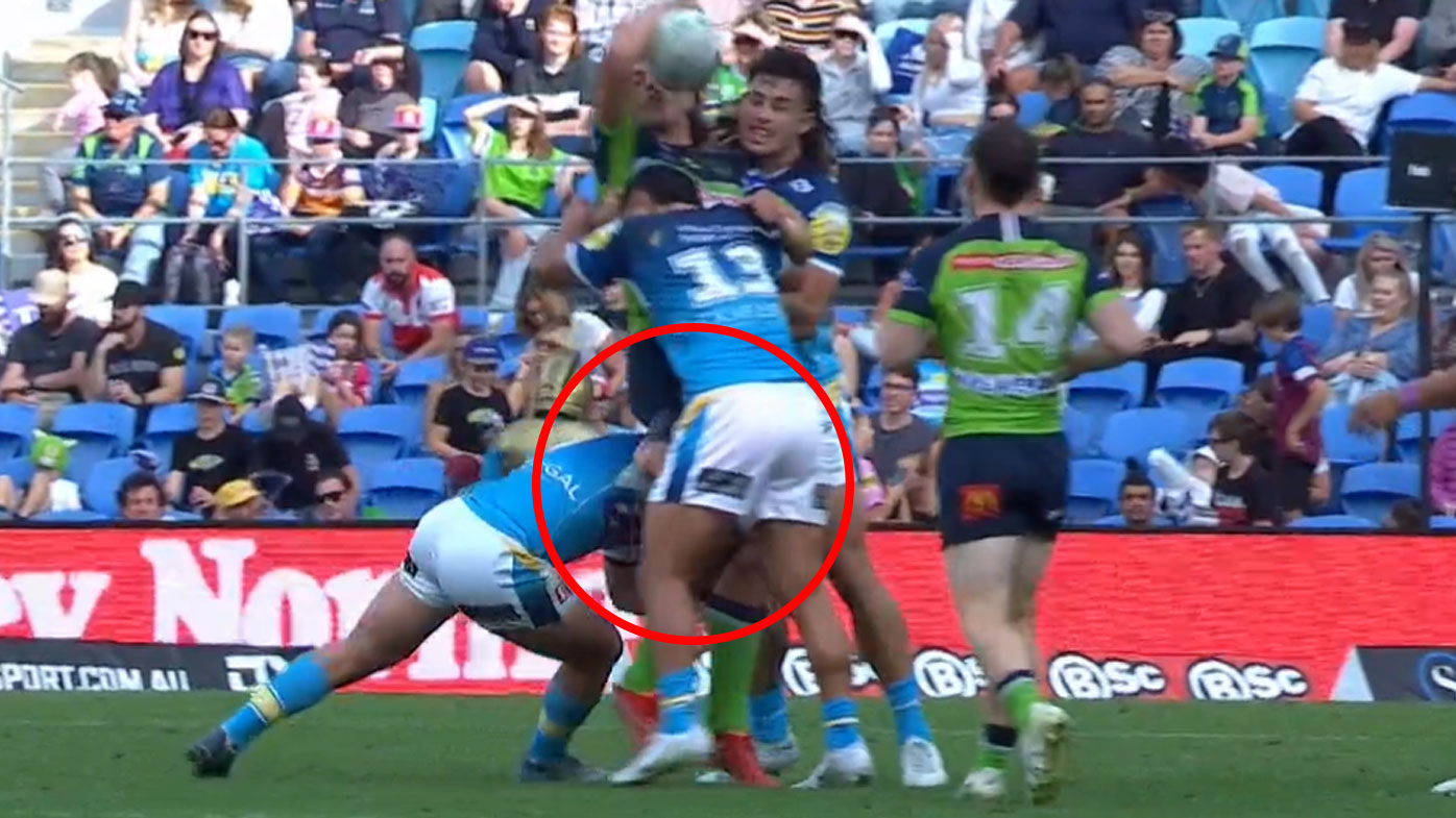 Raiders big man Joseph Tapine took offence to this low tackle from Titans hooker Aaron Booth