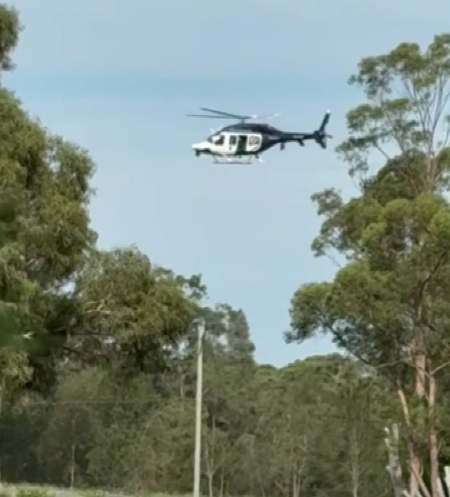 Police are surrounding a house in Sydney's north-west over the disappearance of 85-year-old grandfather Chris Baghsarian.