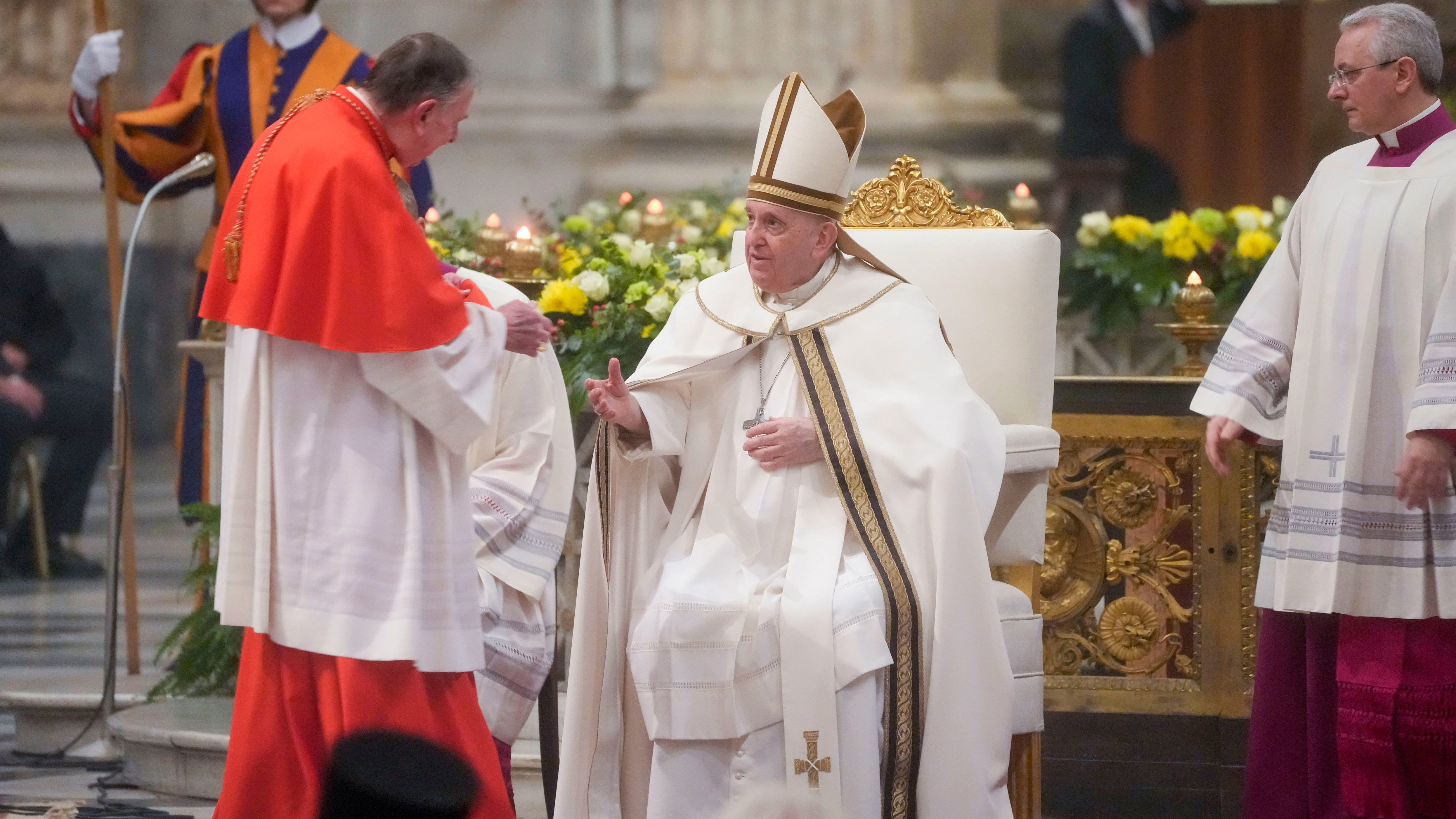 President of the Dicastery for Promoting Christian Unity, Swiss Cardinal Kurt Koch, left, greets Pope Francis at the end of the vespers the latter presided in the Roman Basilica of St. Paul Outside The Walls where the tomb of the Evangelist was built.