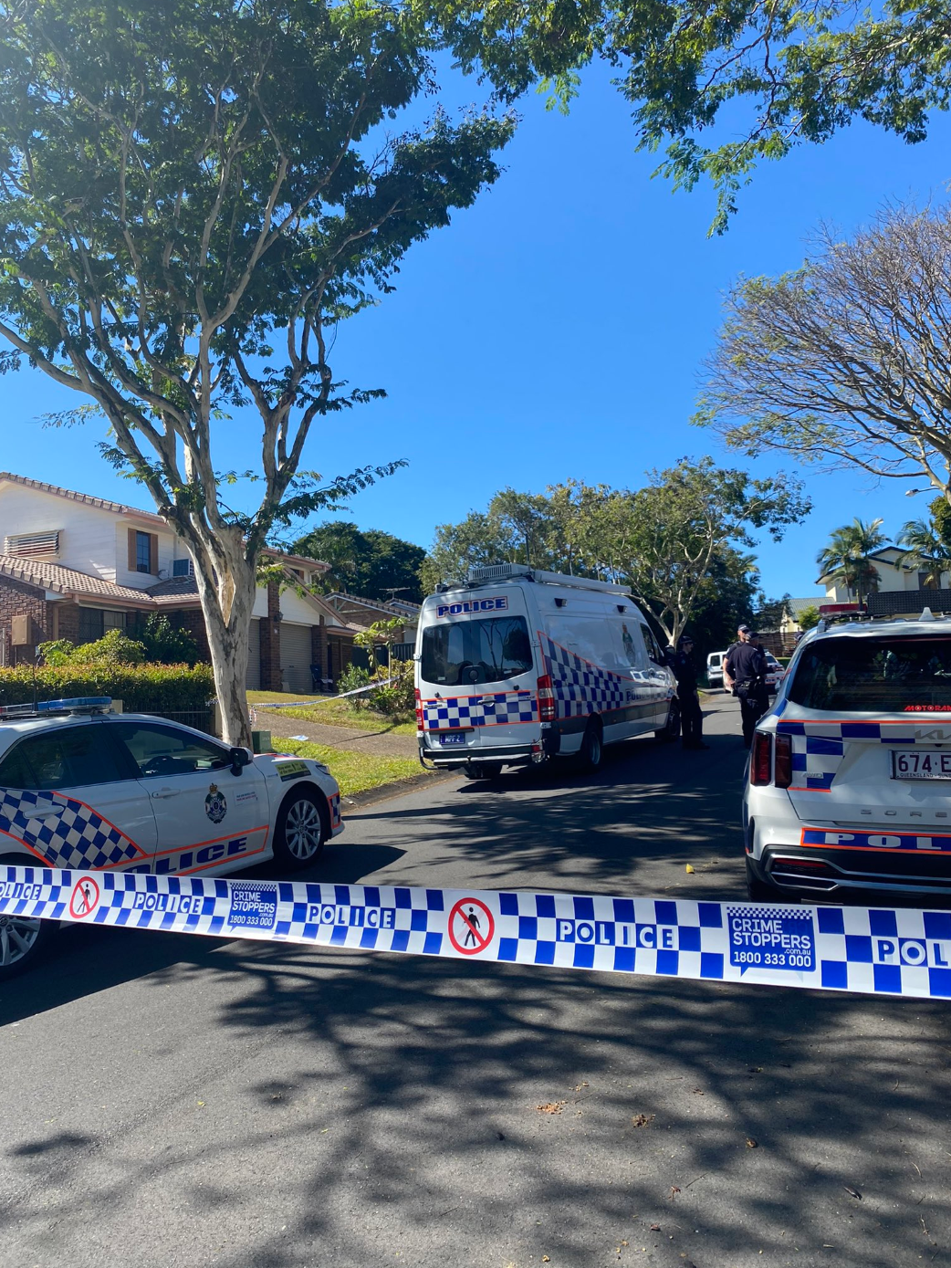 Crime scene established in Stretton Brisbane after two people were found dead.