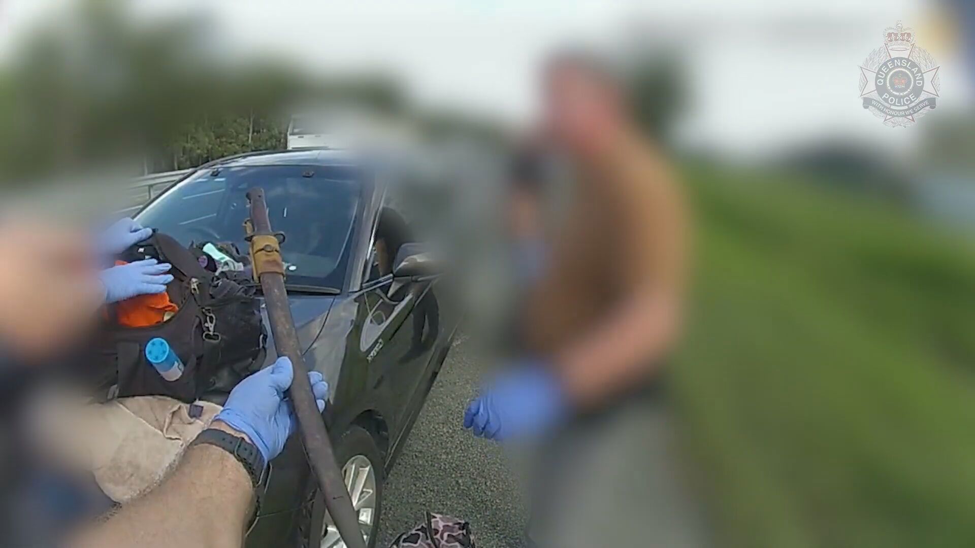 Dramatic arrest footage shows the moment the three men were intercepted on the Logan Motorway 