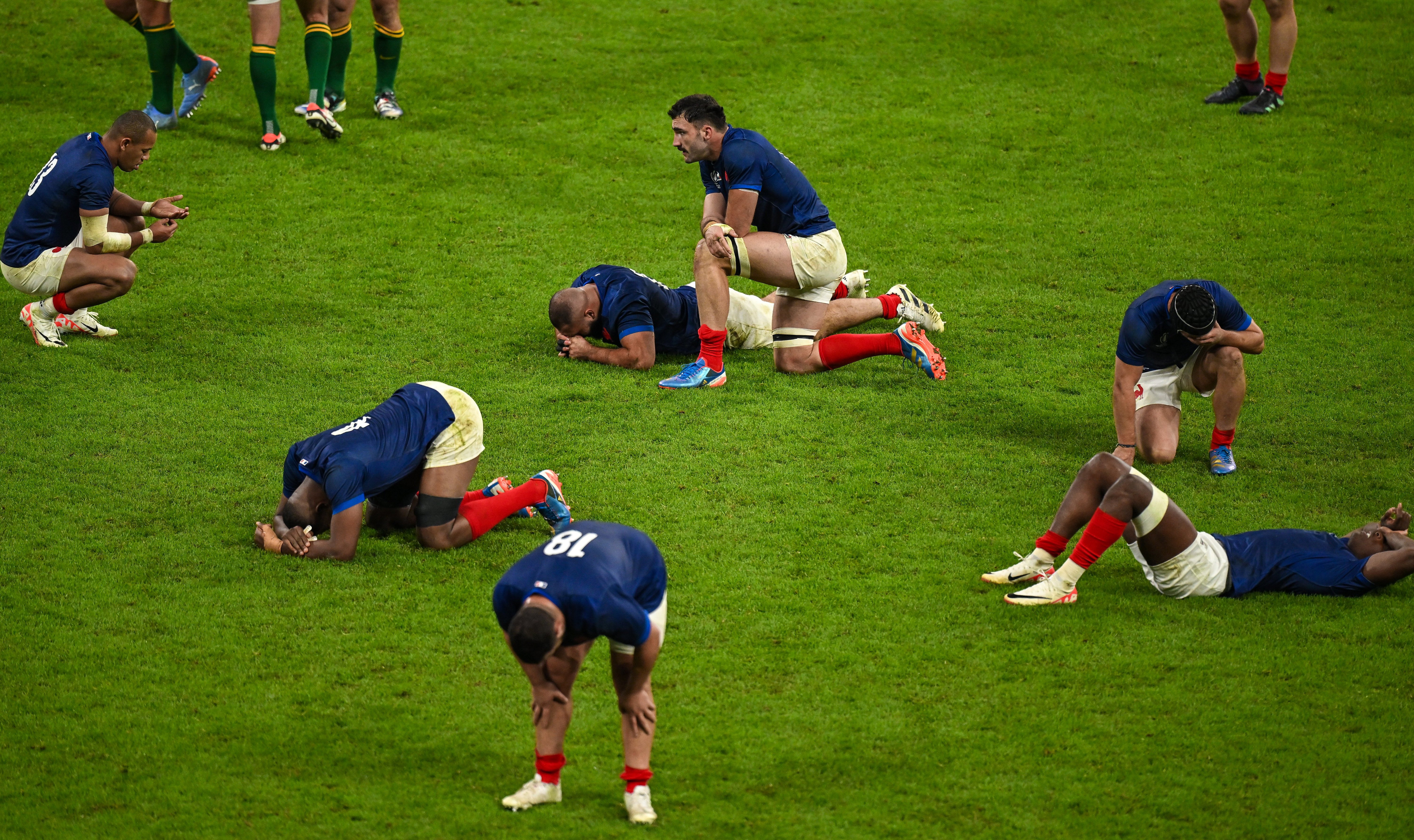 France players react after the 2023 Rugby World Cup quarter-final.