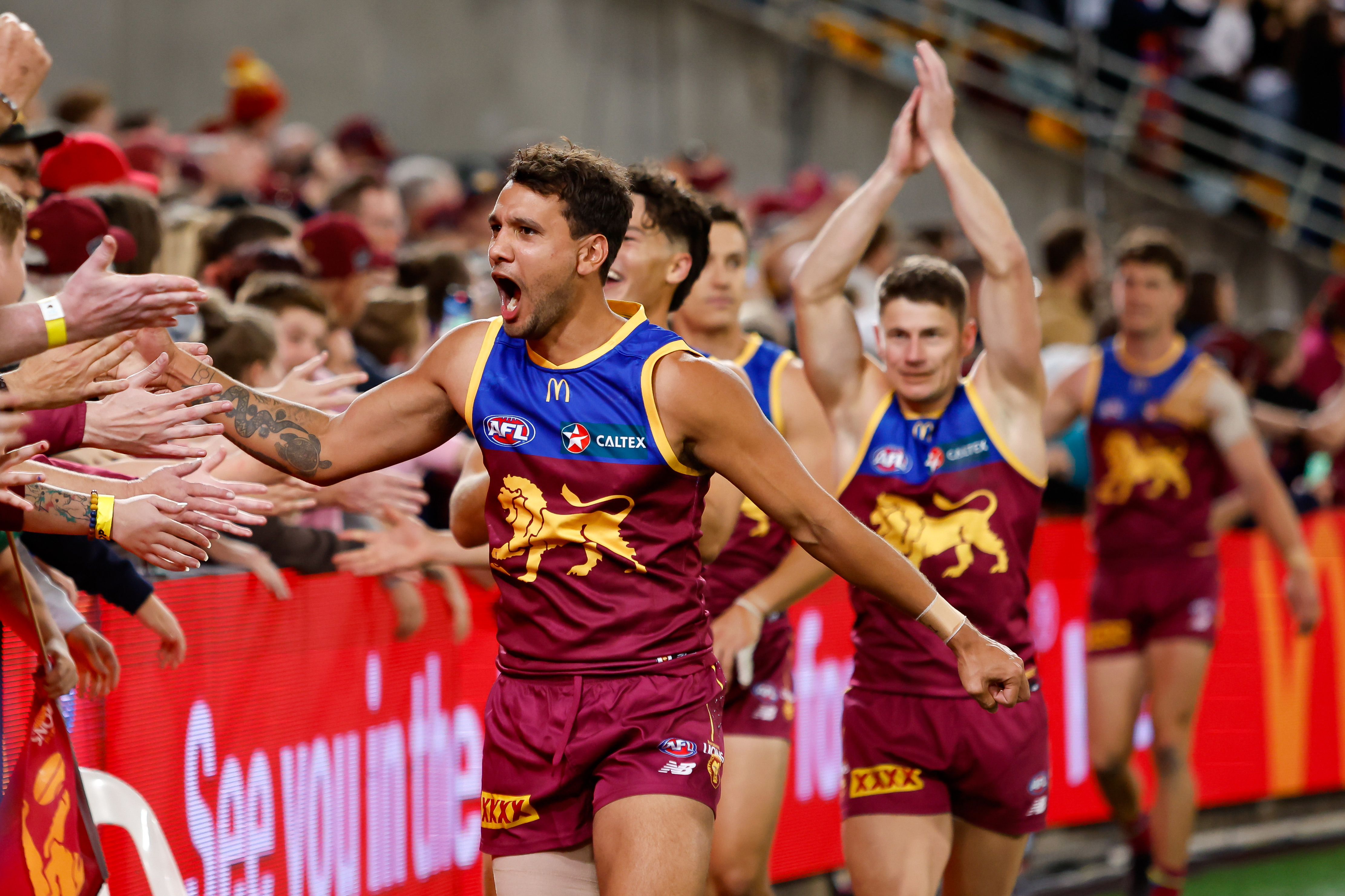 BRISBANE, AUSTRALIA - SEPTEMBER 23: Callum Ah Chee of the Lions celebrates during the 2023 AFL Second Preliminary Final match between the Brisbane Lions and the Carlton Blues at The Gabba on September 23, 2023 in Brisbane, Australia. (Photo by Dylan Burns/AFL Photos via Getty Images)