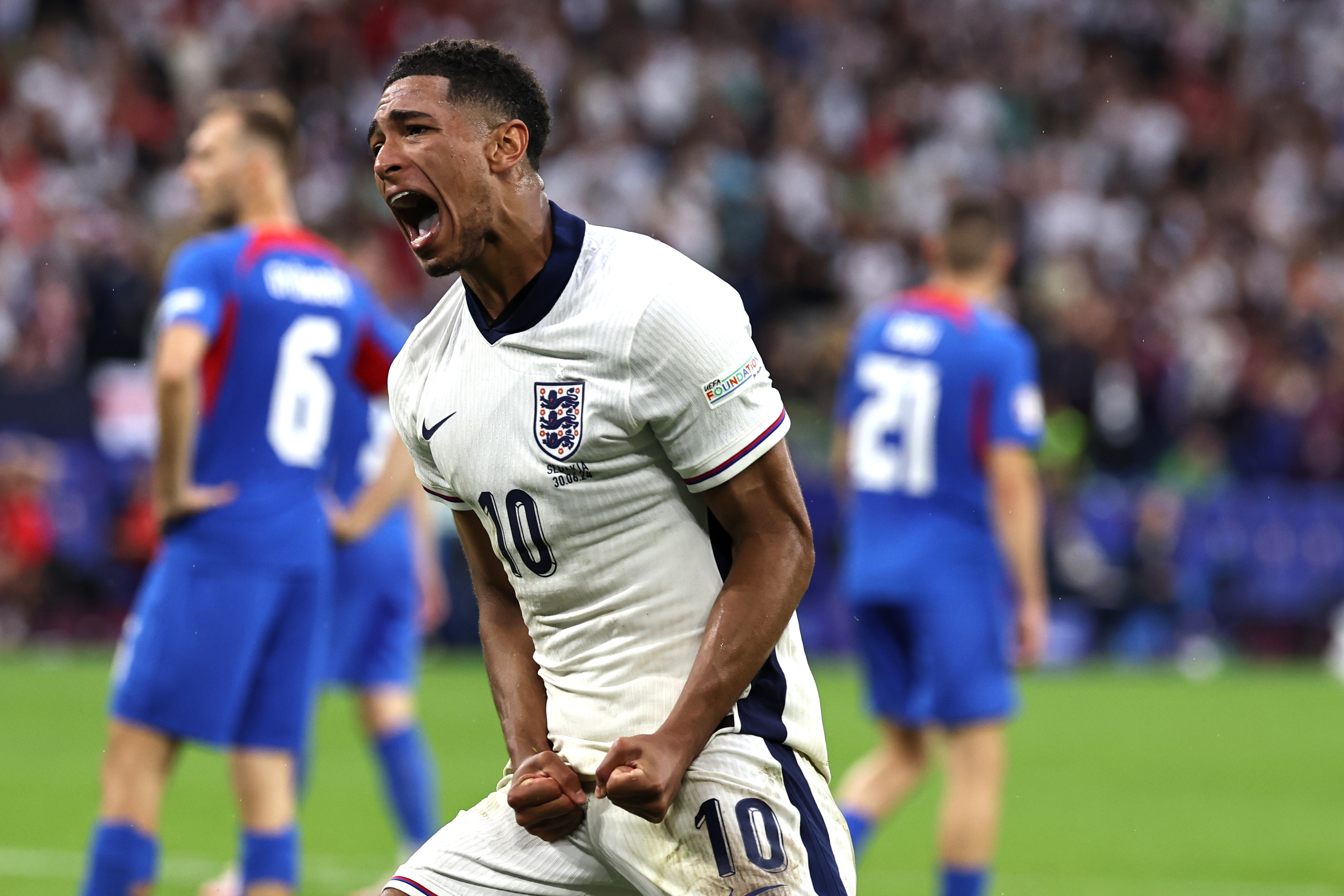 Jude Bellingham of England celebrating his goal to make it 1-1 against Slovakia.