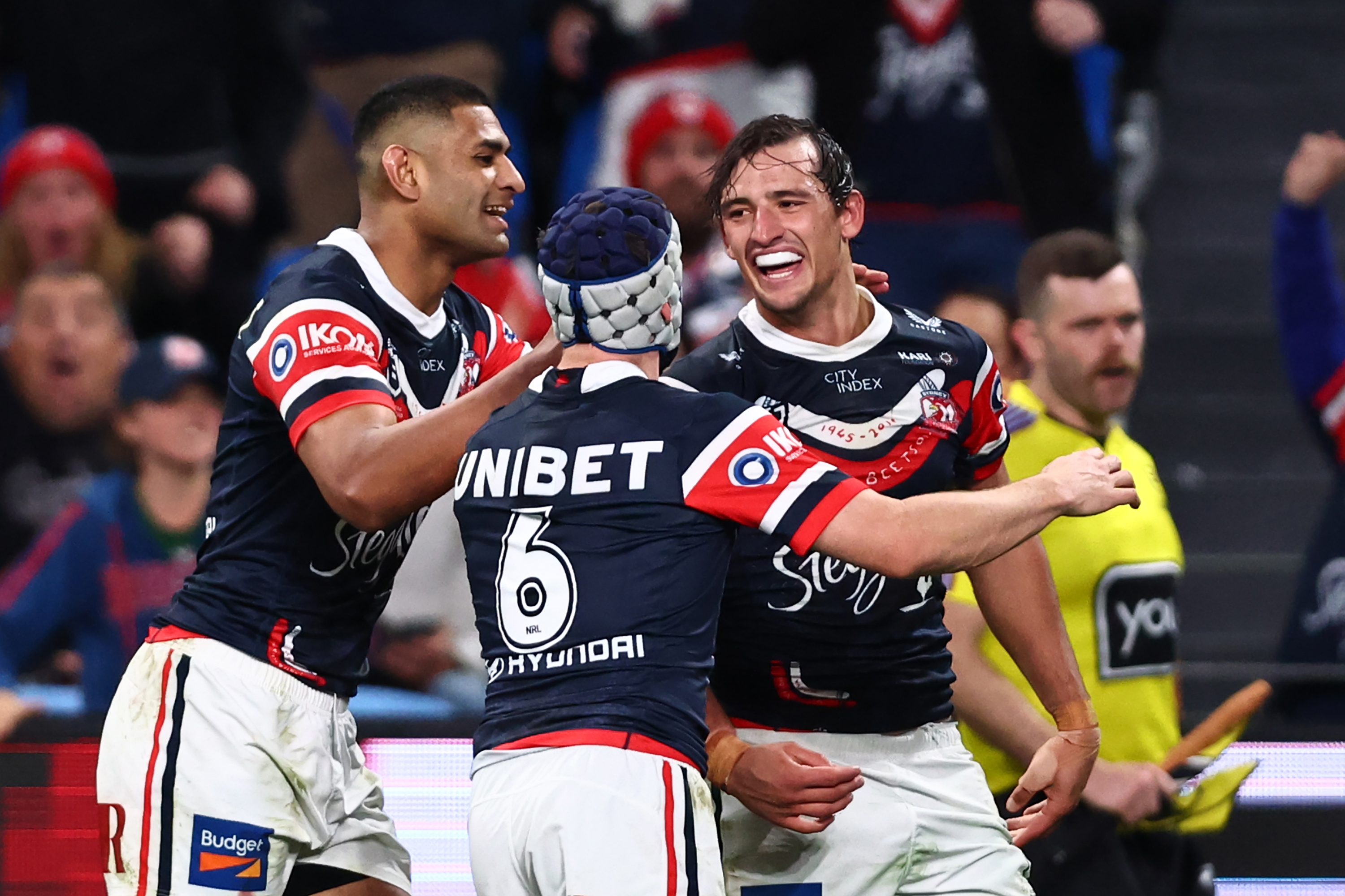 Billy Smith of the Roosters celebrates scoring a try.