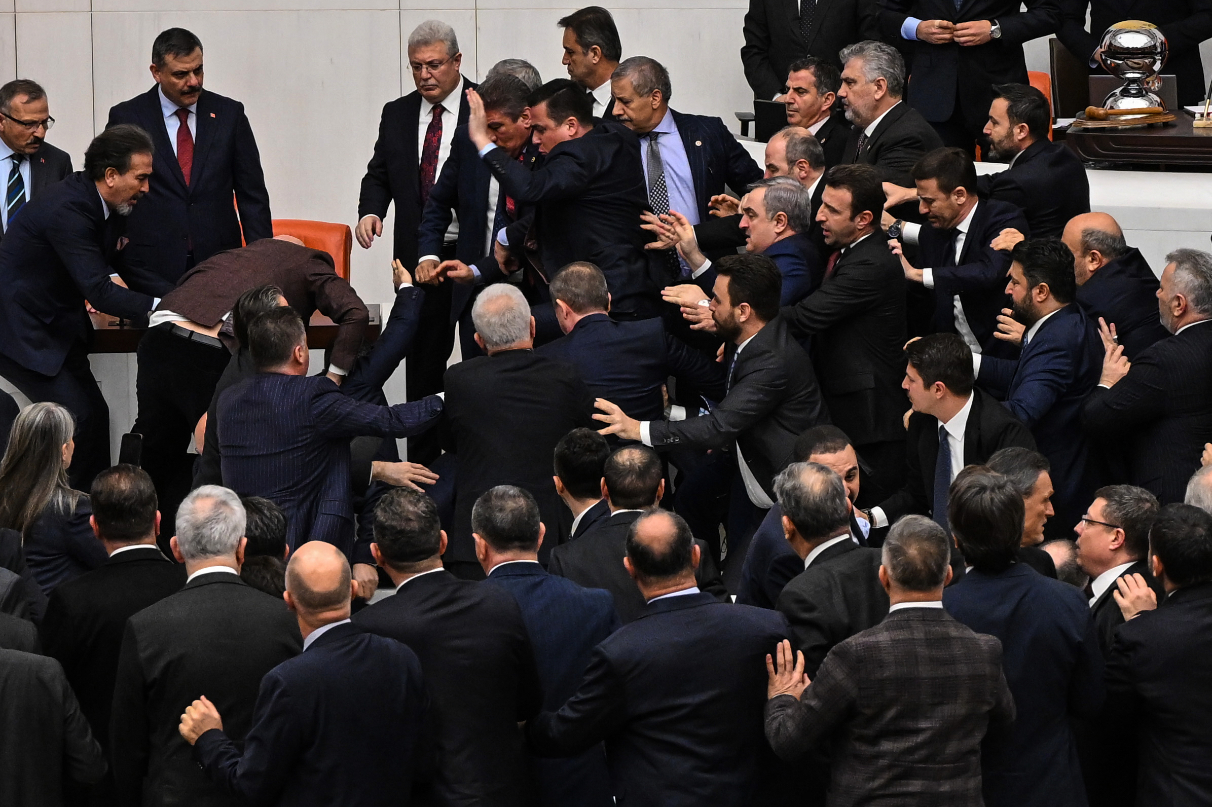 Turkey's ruling party and opposition lawmakers clash over the appointment of Istanbul Chief Prosecutor Akin Gurlek as justice minister at the parliament in Ankara, Turkey, Wednesday, Feb. 11, 2026. (Ugur Yildirim/DIA Photo via AP)