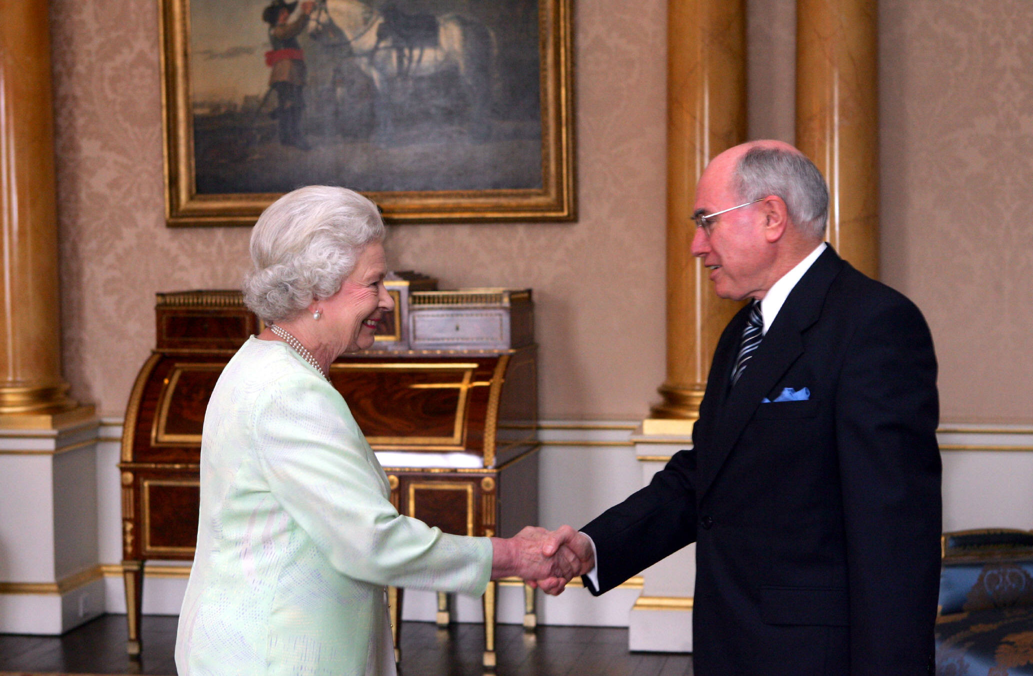 Former Prime Minister John Howard has an audience with Her Majesty The Queen at Buckingham Palace in 2005.