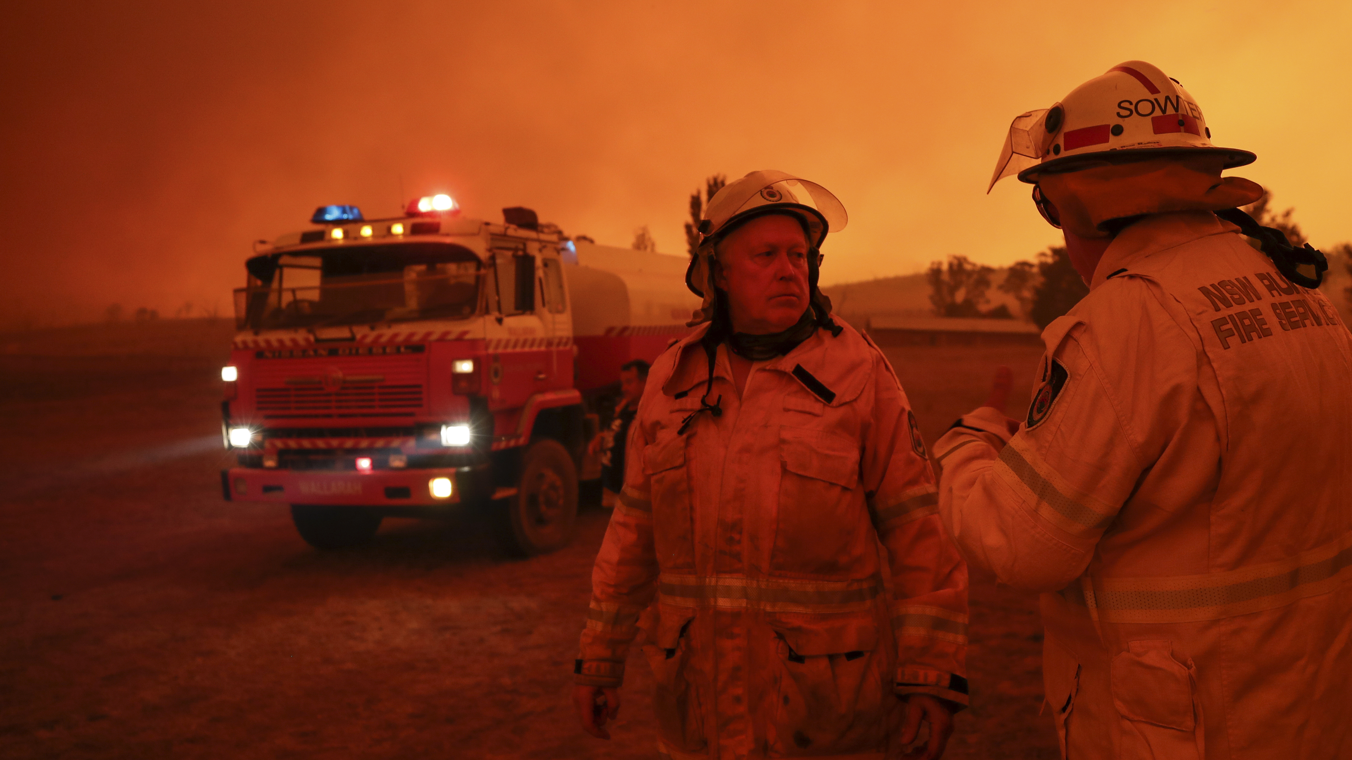 RFS firefighters defend properties in Bumbalong, NSW, on Saturday 1 February 2020.