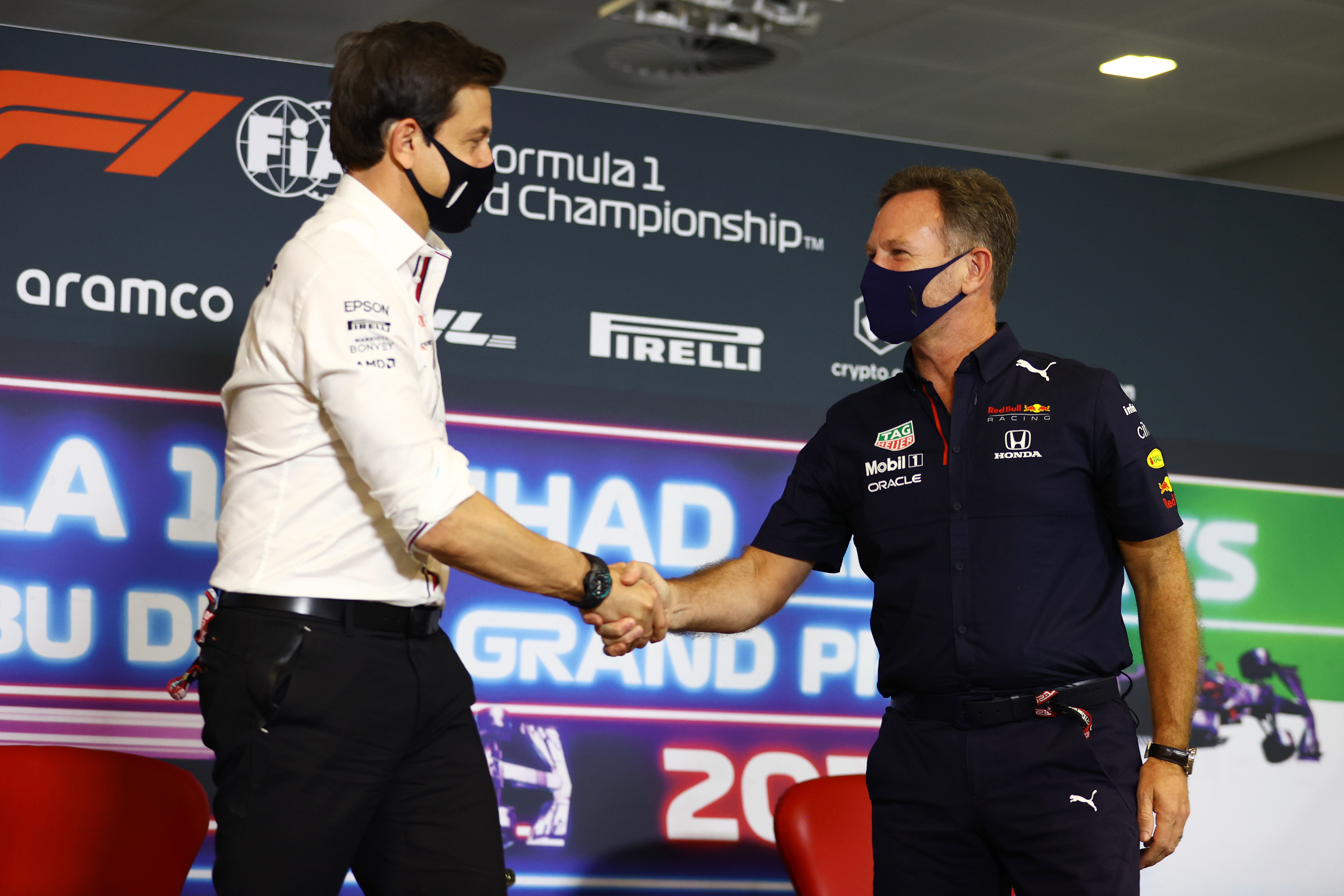 Toto Wolff and Christian Horner shake hands in the team principals press conference ahead of the Abu Dhabi Grand Prix.