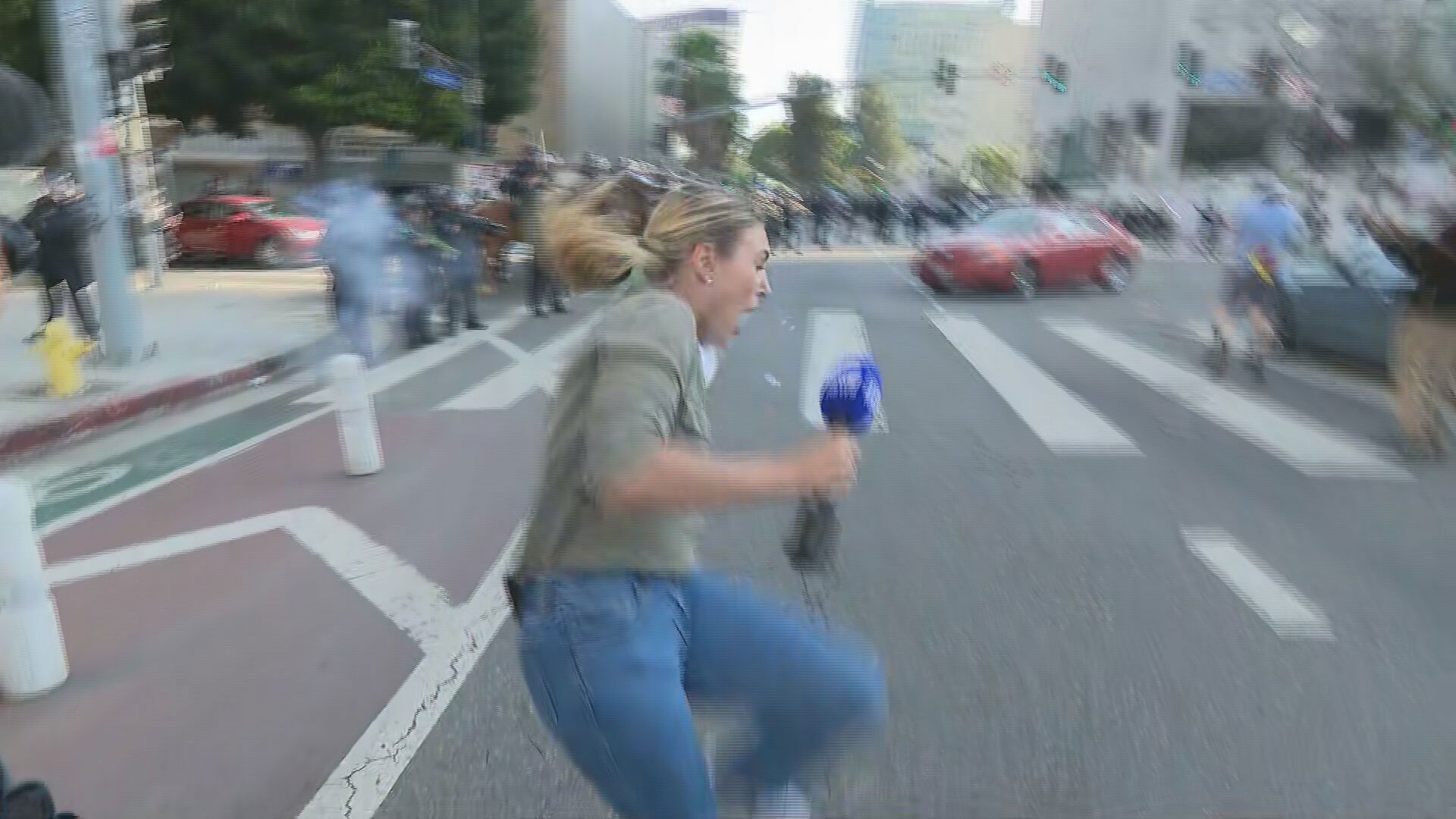 Aussie reporter caught in crossfire of violent protests