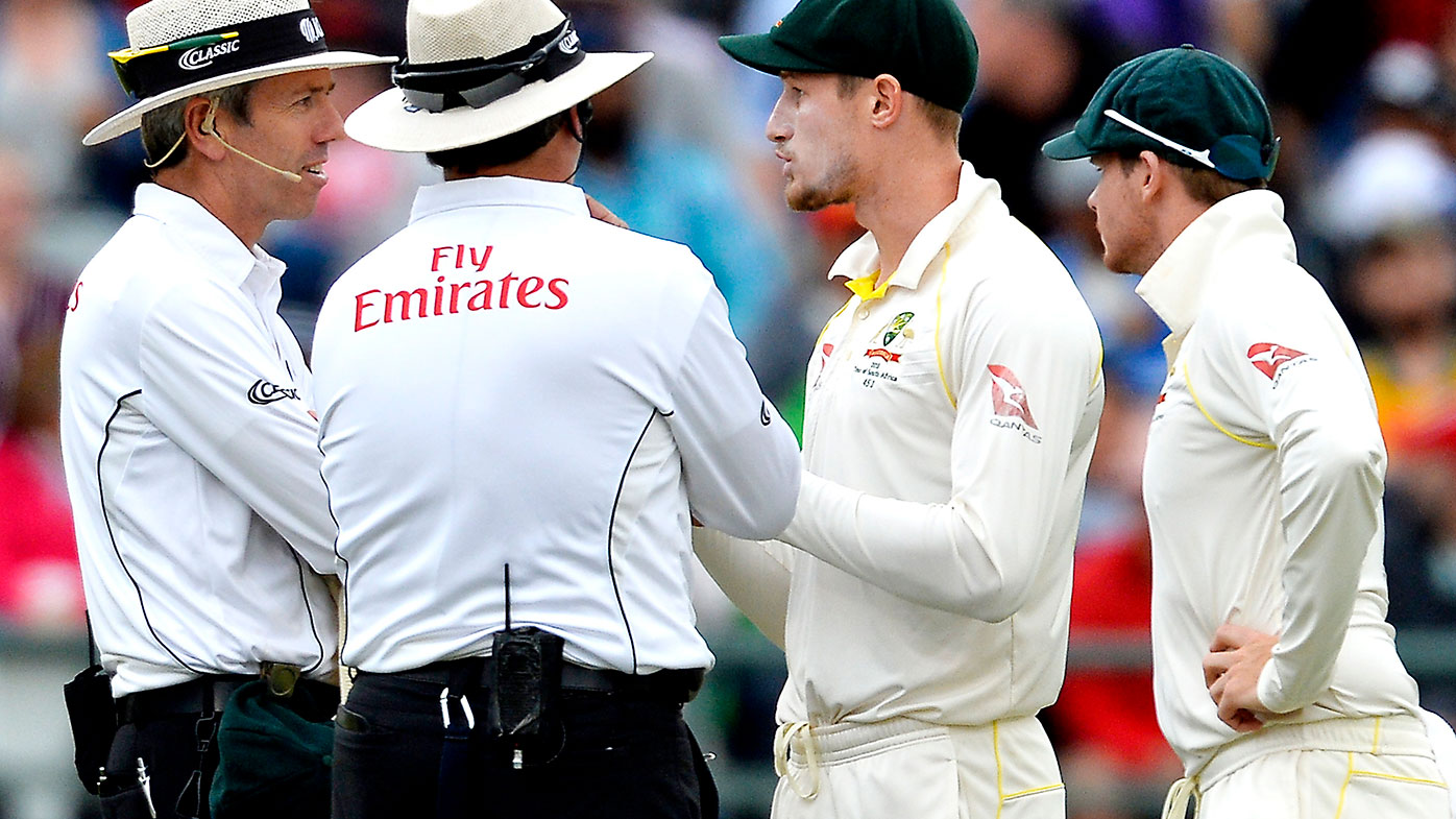 Cameron Bancroft and Steve Smith in discussions with the umpires during the Cape Town Test.