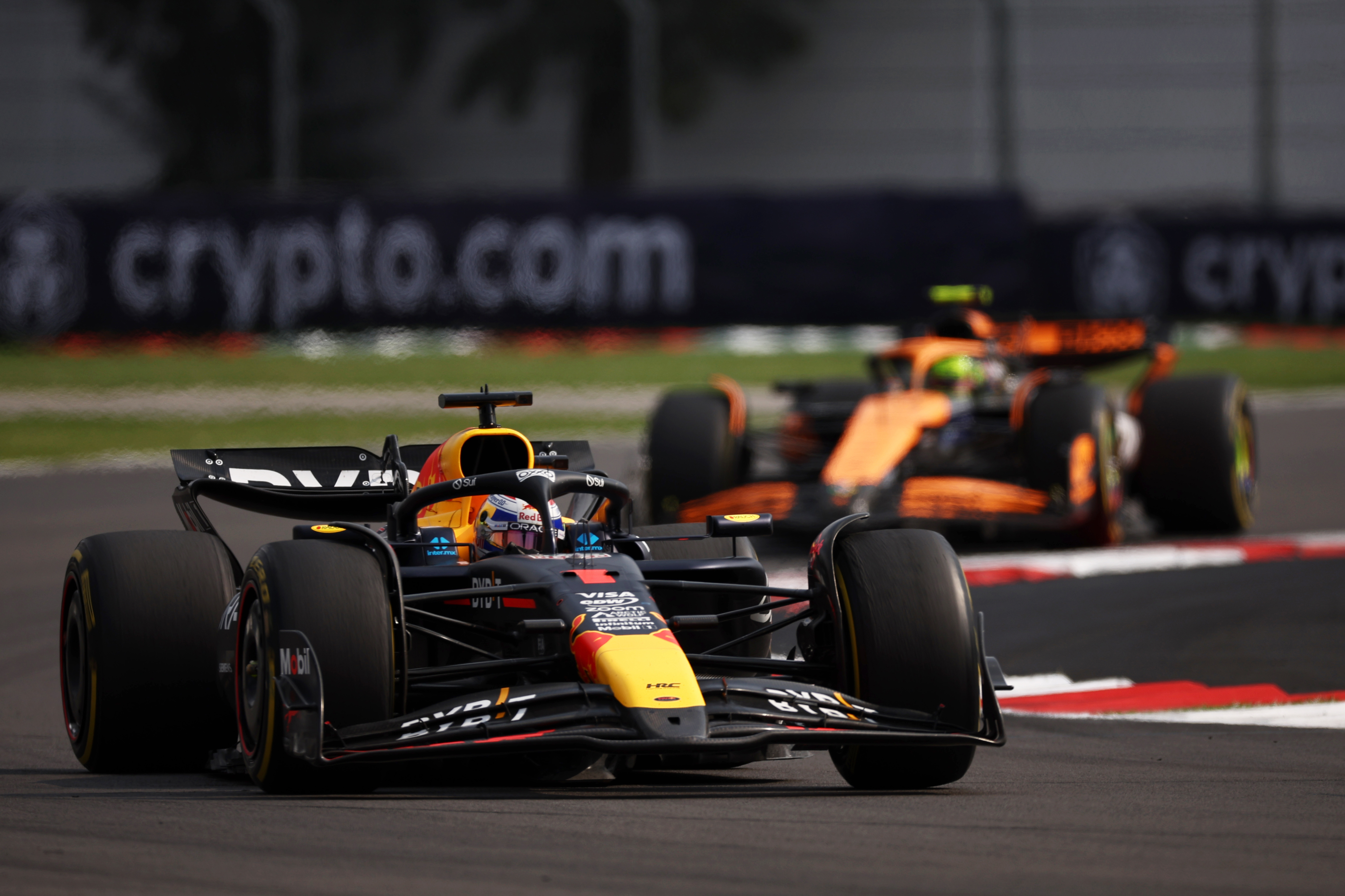 Max Verstappen of the Netherlands driving the (1) Oracle Red Bull Racing RB20 leads Lando Norris of Great Britain driving the (4) McLaren MCL38 Mercedes on track during the F1 Grand Prix of Mexico at Autodromo Hermanos Rodriguez on October 27, 2024 in Mexico City, Mexico. (Photo by Jared C. Tilton/Getty Images)