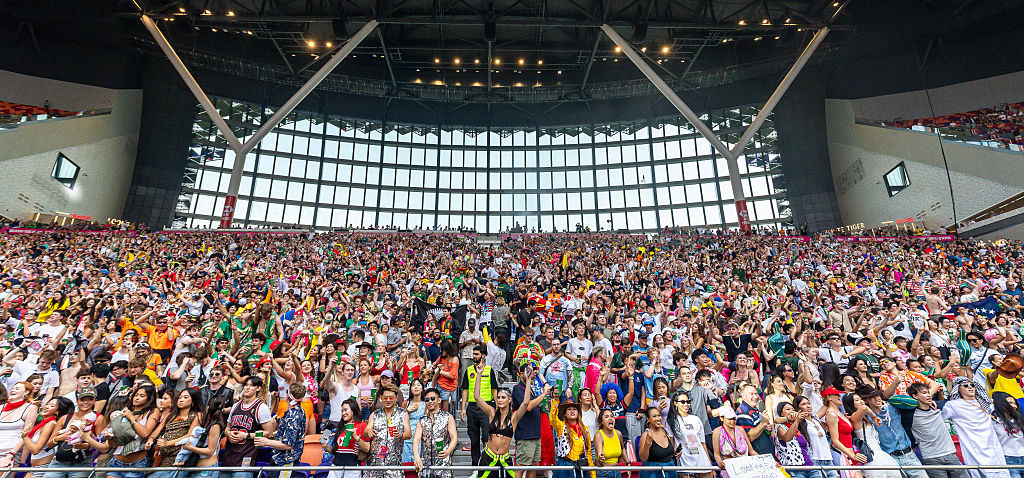 Fans cheer at the South Stand during day three of the Hong Kong Sevens at Kai Tak Stadium.