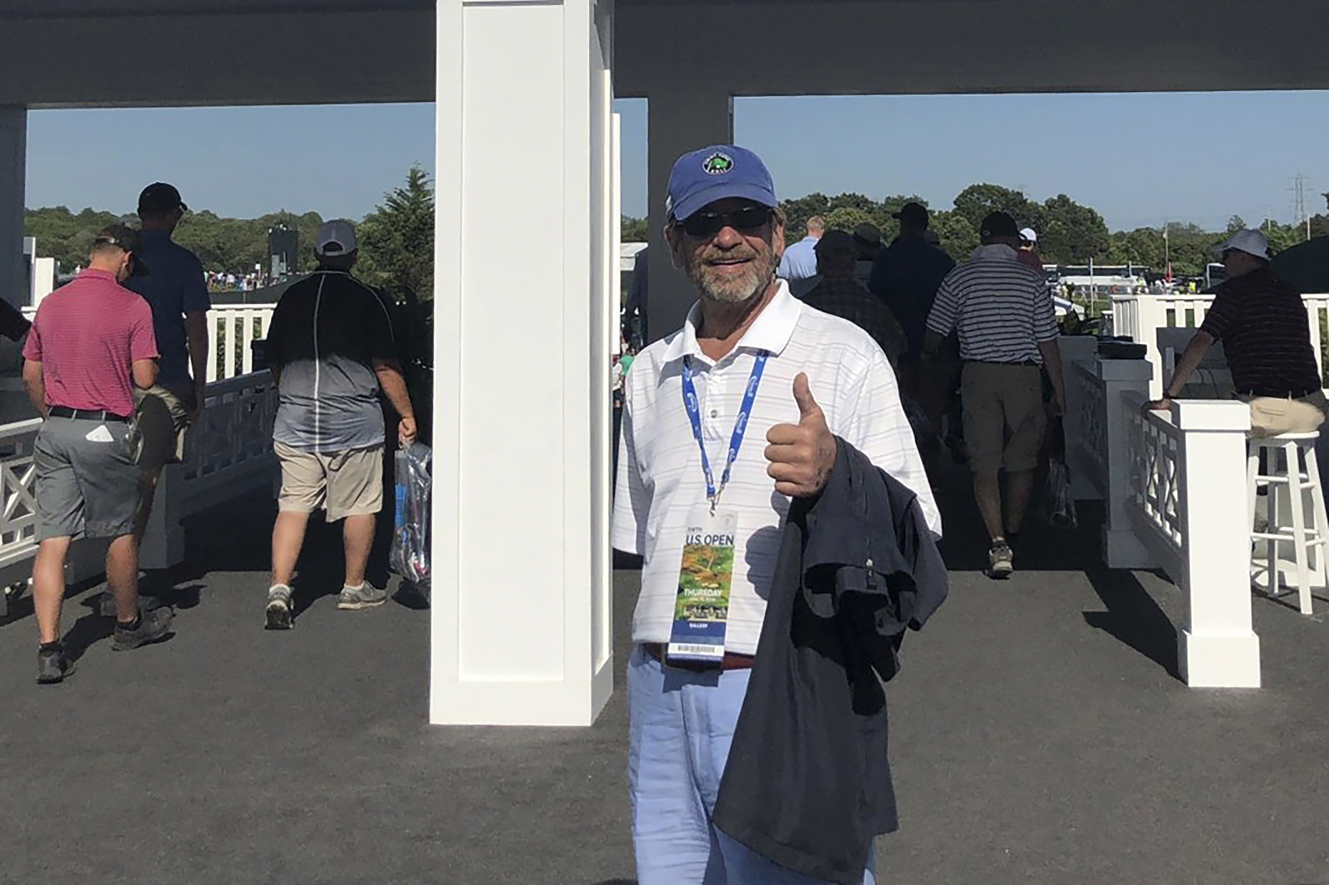 Tom Randele at an entrance to the 2018 US Open Golf Tournament at Shinnecock Hills Golf Club. 