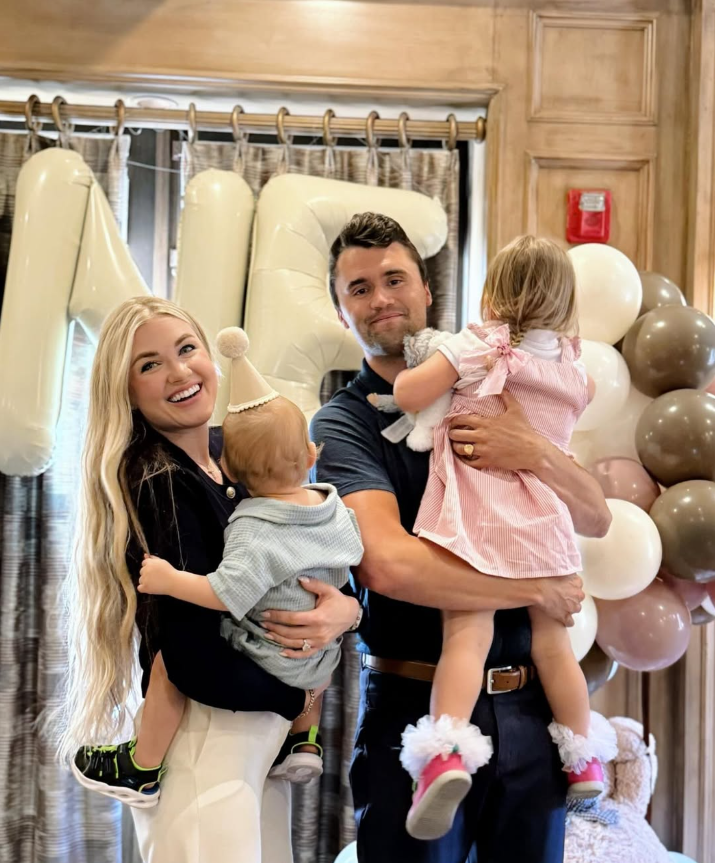Charlie Kirk, his wife Erika Frantzve and his two children.