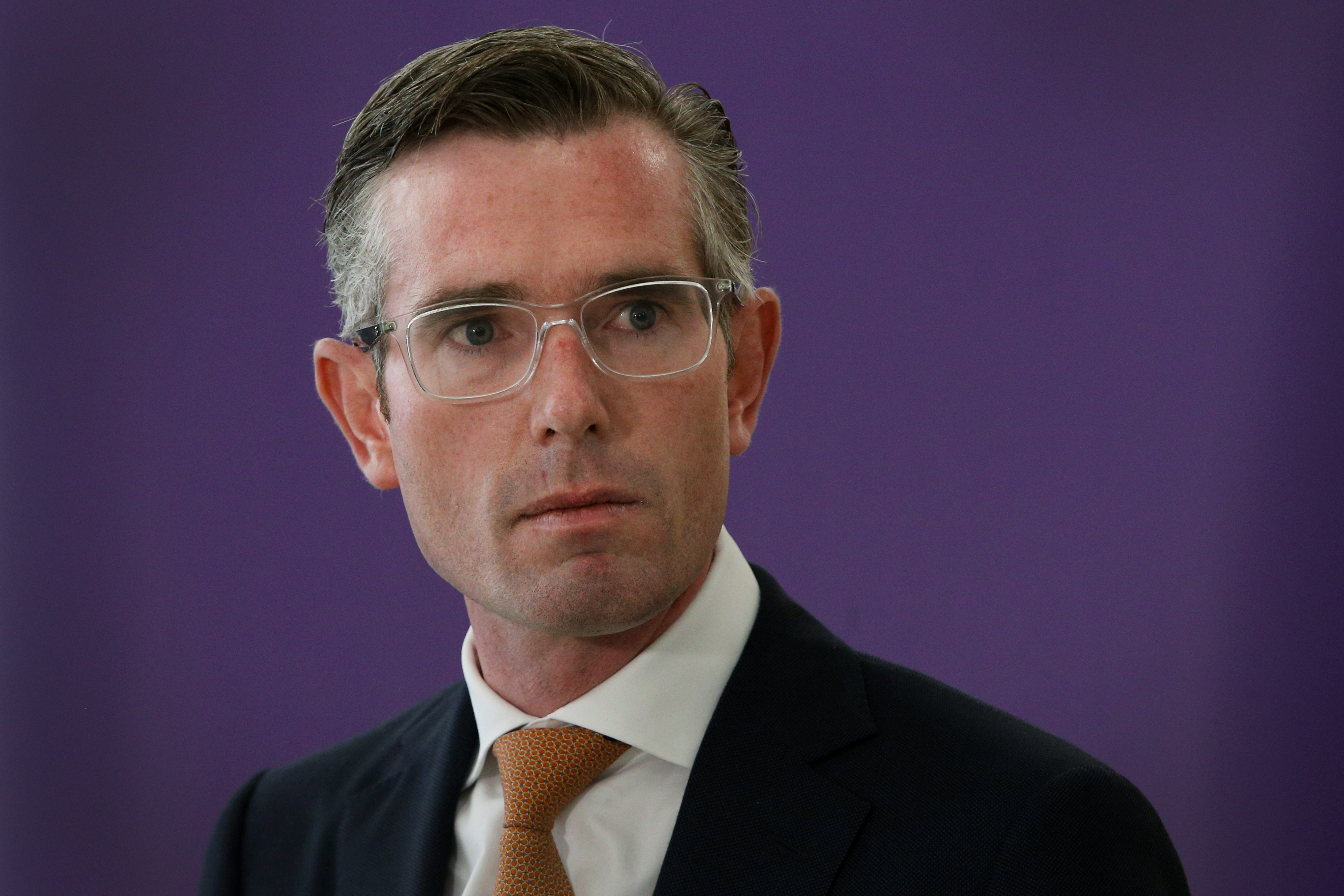 SYDNEY, AUSTRALIA - FEBRUARY 21: NSW Premier Dominic Perrottet addresses the media at Sydney's International Airport on February 21, 2022 in Sydney, Australia. Australia is welcoming fully-vaccinated international travellers for the first time since closing its borders to all non-citizens and non-residents in March 2020 in the effort to limit the spread of COVID-19. (Photo by Lisa Maree Williams/Getty Images)