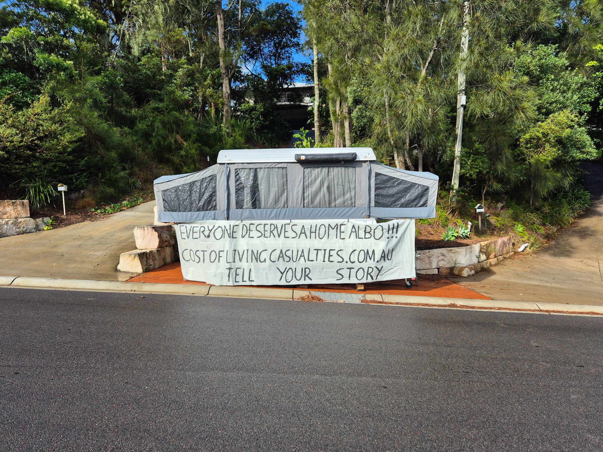 A protester has pitched a tent outside of ﻿Prime Minister Anthony Albanese's home to raise awareness of the housing crisis.