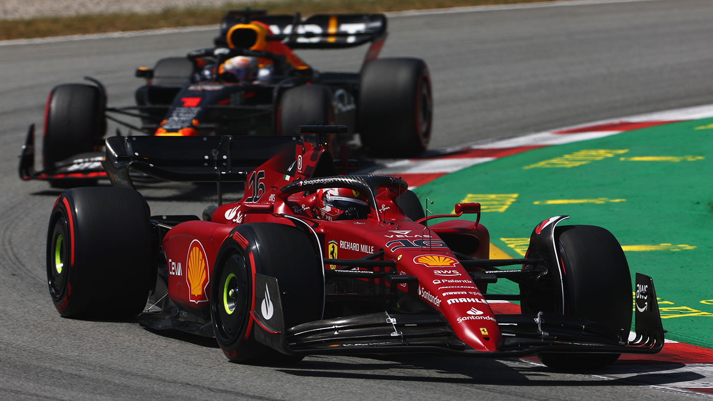 Charles Leclerc leads Max Verstappen early in the Spanish Grand Prix.