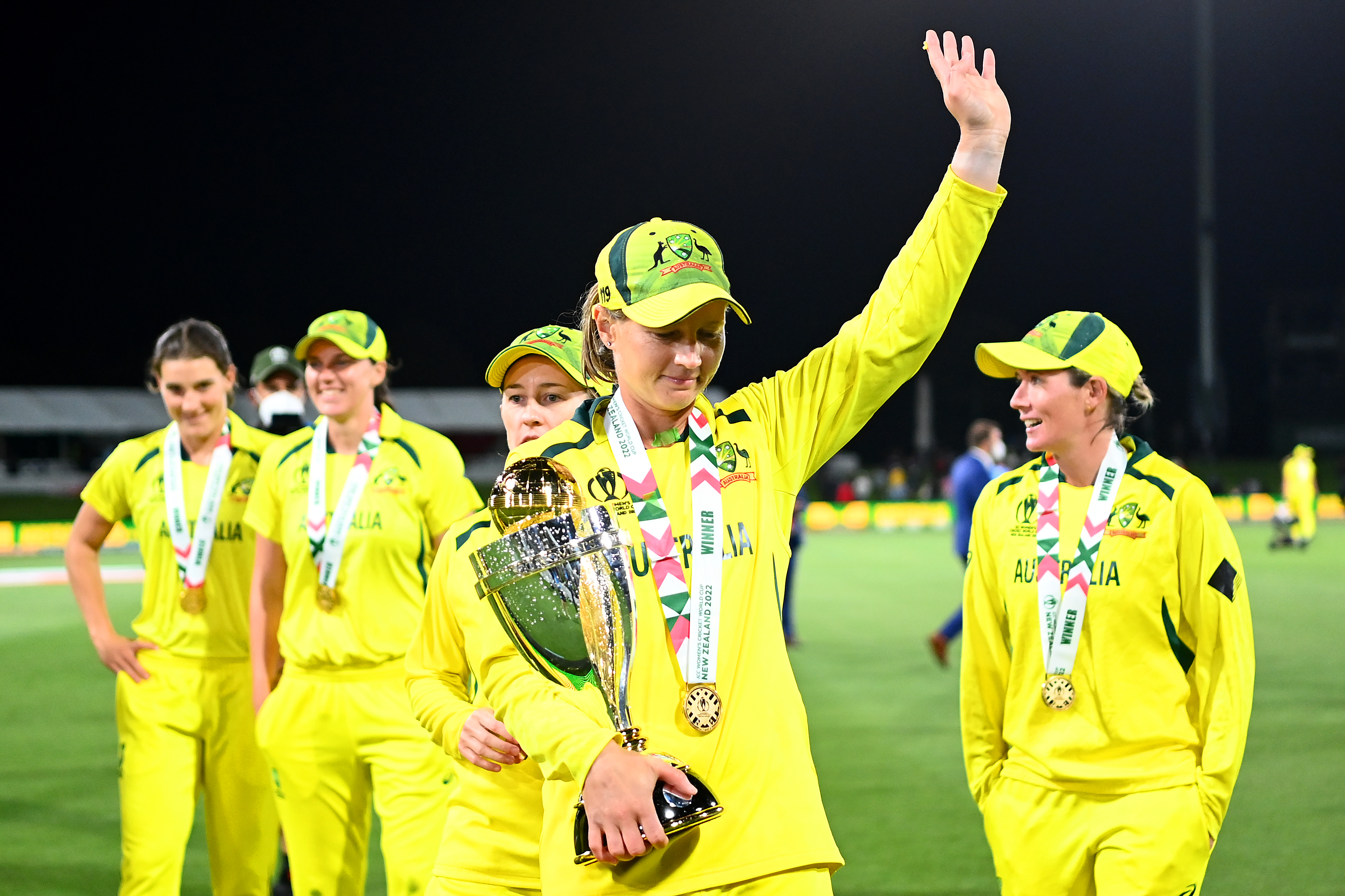 Australia captain Meg Lanning celebrates with the 2022 Women's Cricket World Cup trophy.