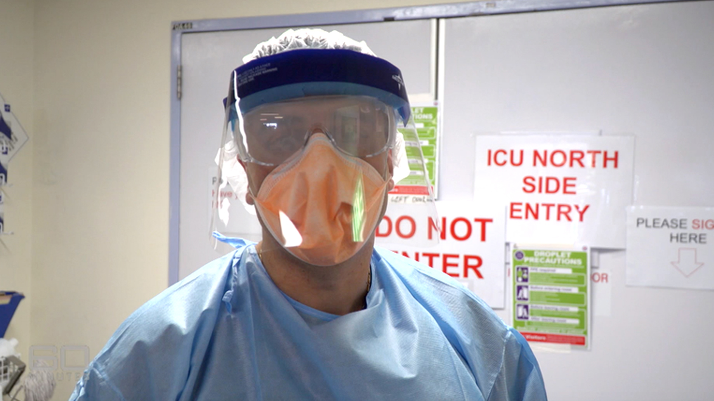 Dr Luke Torre in full Personal Protective Equipment heading into a COVID-19 ICU ward.