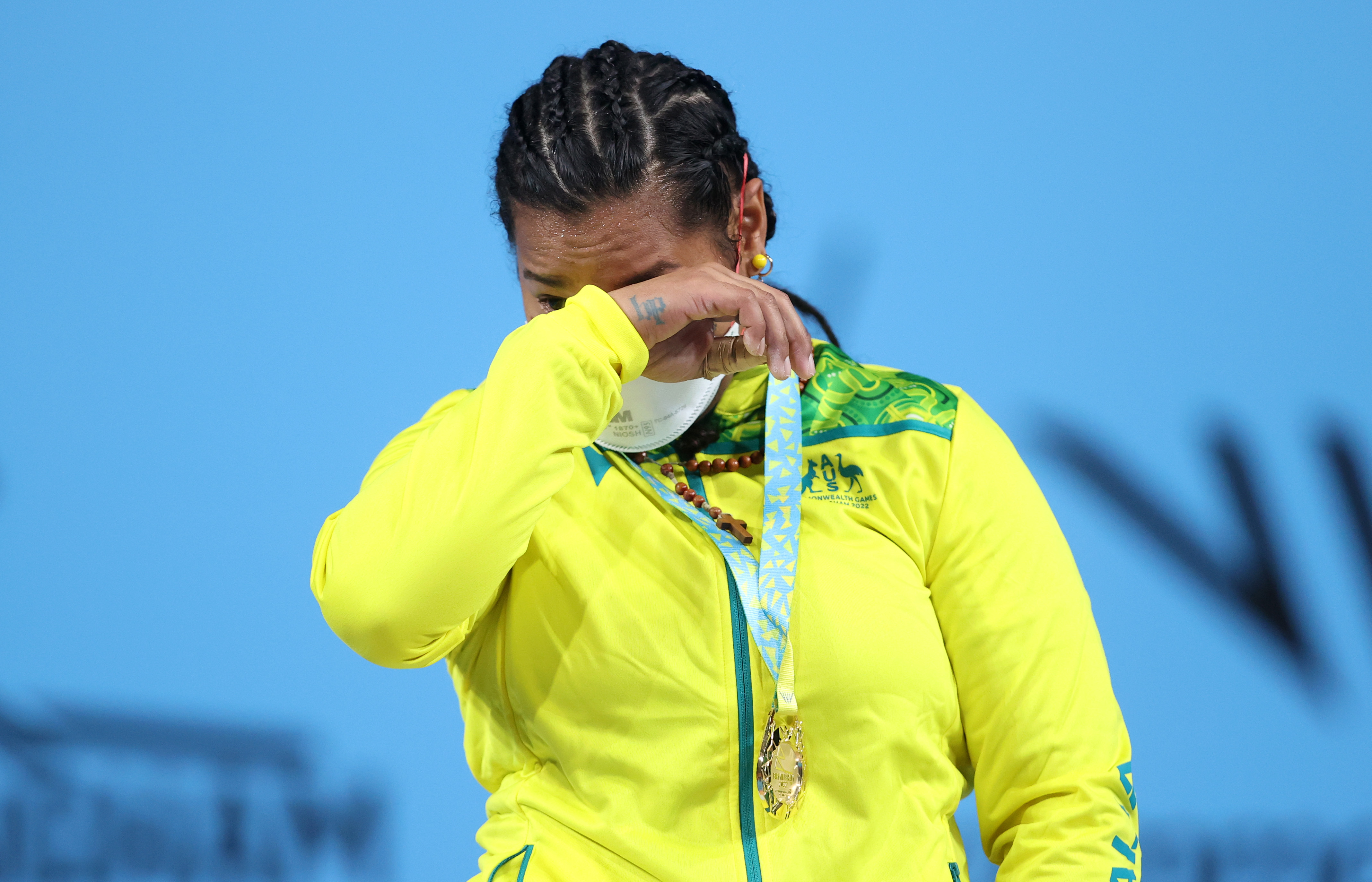 Eileen Cikamatana of Team Australia breaks down crying after winning gold in the women's 87kg weightlifting at the Birmingham 2022 Commonwealth Games.