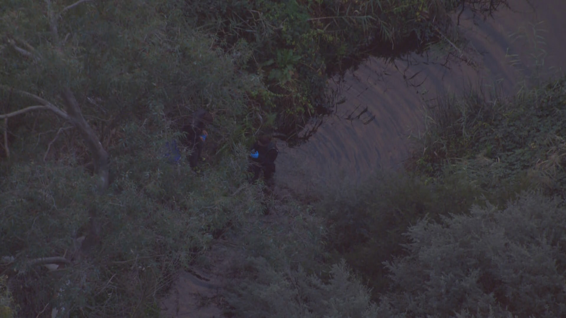Body pulled from creek triggers police investigation