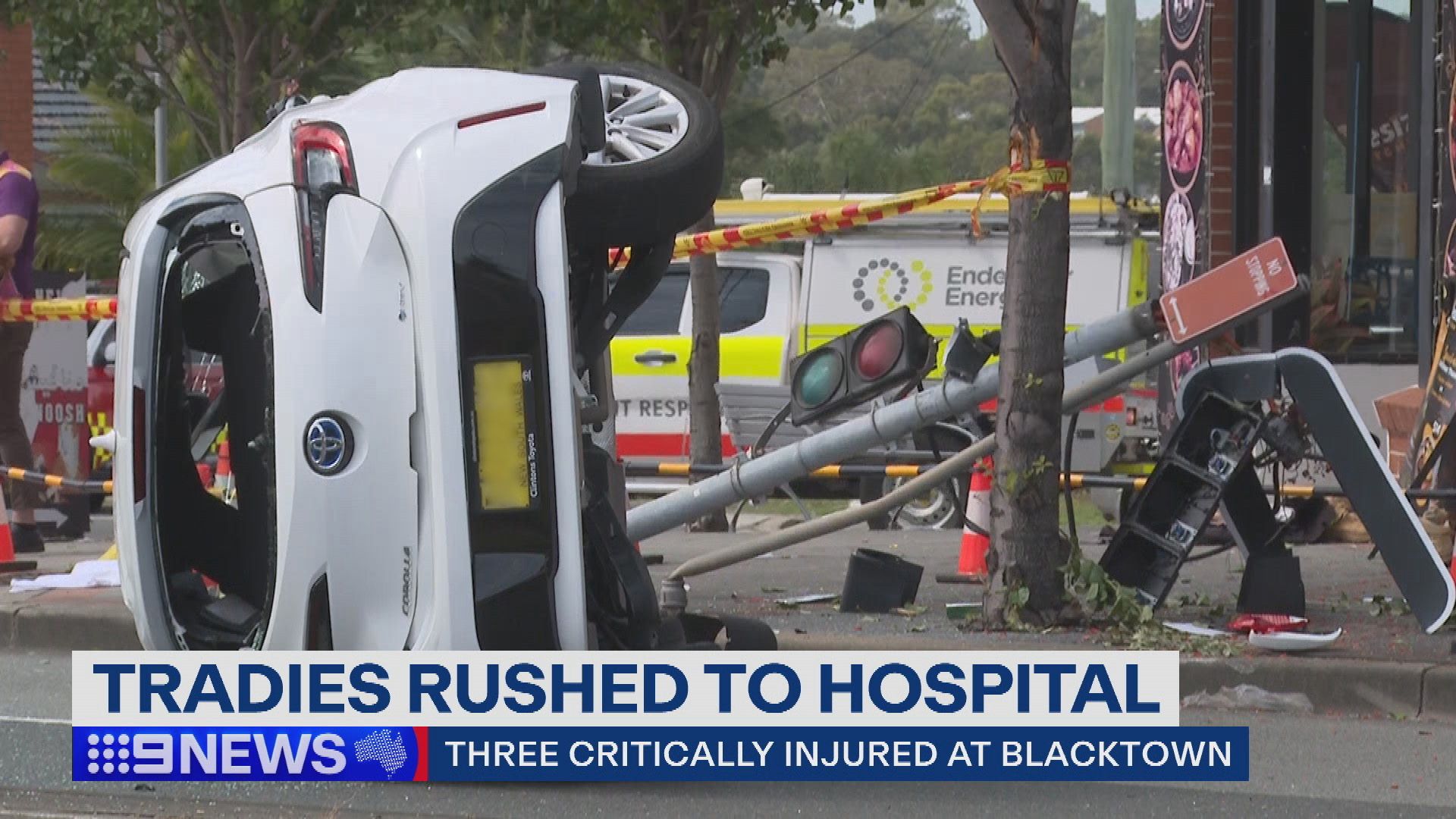 A white Toyota Corolla flipped on its side after colliding with three pedestrians in Blacktown.