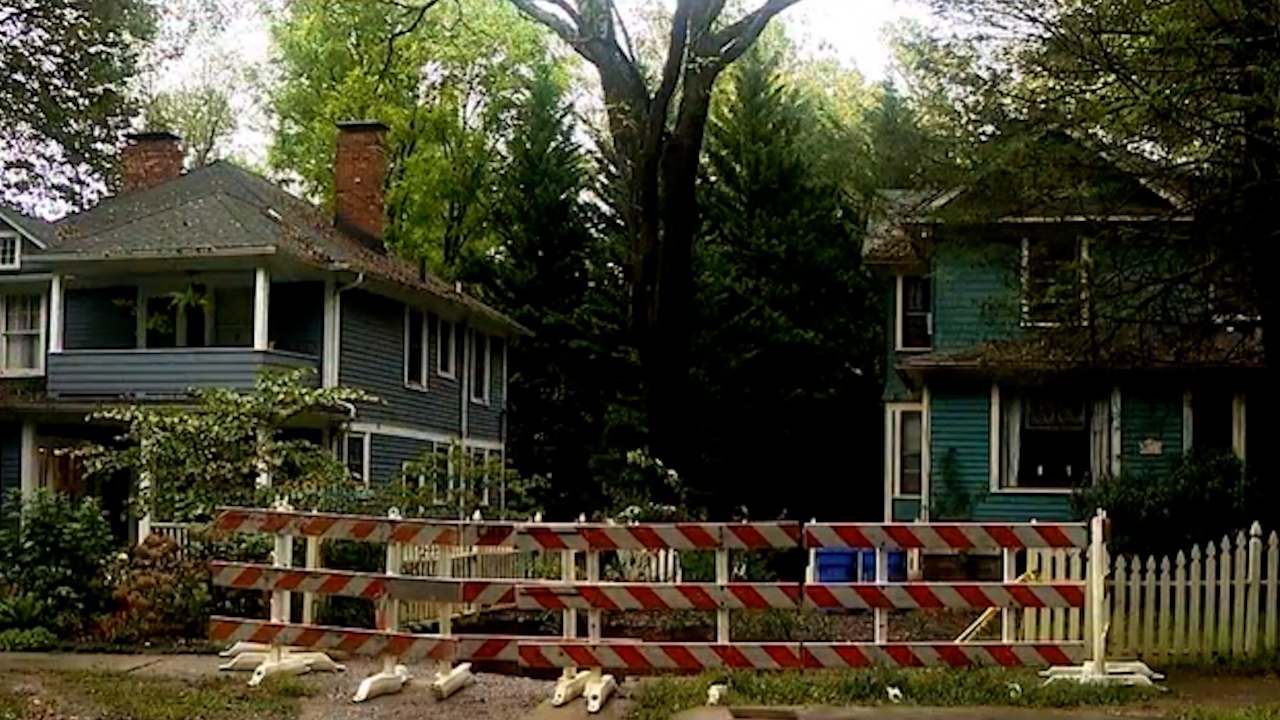 Nat Dickinson said the sinkhole is blocking storm culverts, forcing storm water into nearby homes, like his own.