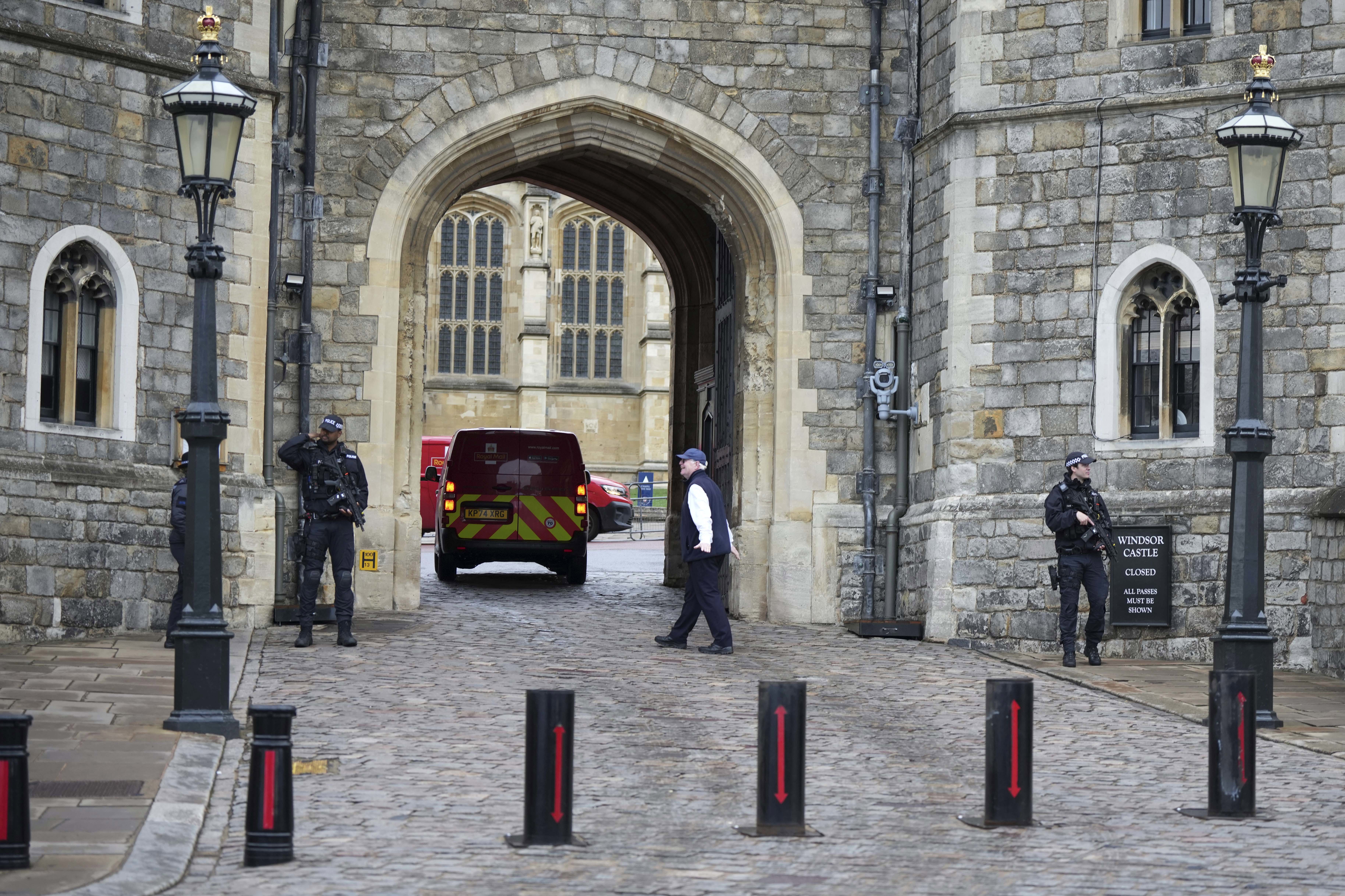 Armed police officer guard the entrance to Windsor Castle ahead of the arrival of President Donald Trump in Windsor.