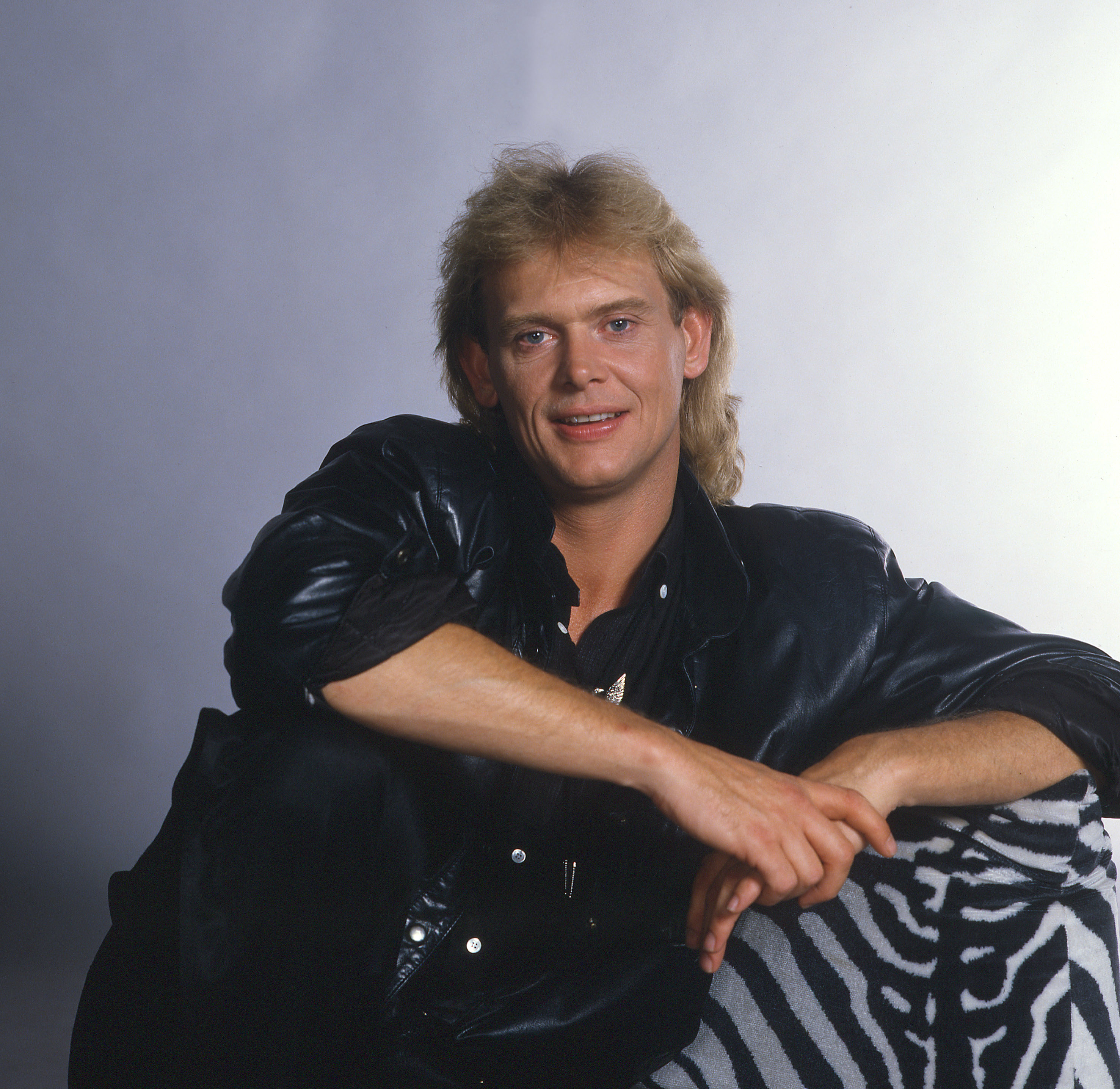 John Peter Farnham 1987. (Born July 1, 1949) is an English-born Australian pop singer. Whilst not having the international success of, for example, Olivia Newton-John, Kylie Minogue, Savage Garden, or The Seekers, domestically he has remained one of Australia's best-known performers over a career spanning more than 30 years. He is the only Australian artist to have a number one record in five consecutive decades (echoing Sir Cliff Richard in the United Kingdom).