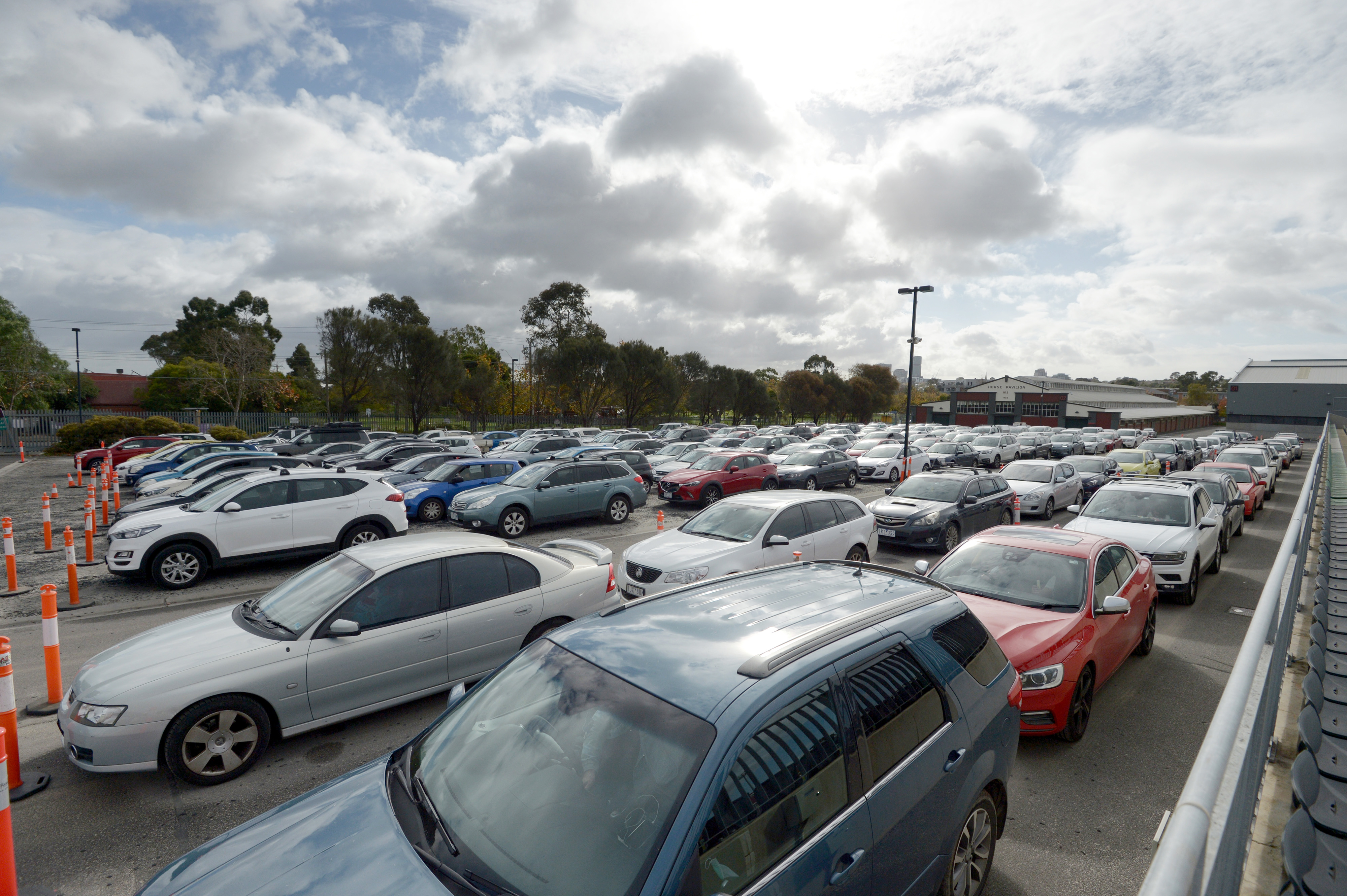 Huge queues for COVID-19 tests, such as this one at the Melbourne Showgrounds, may be a thing of the past. 