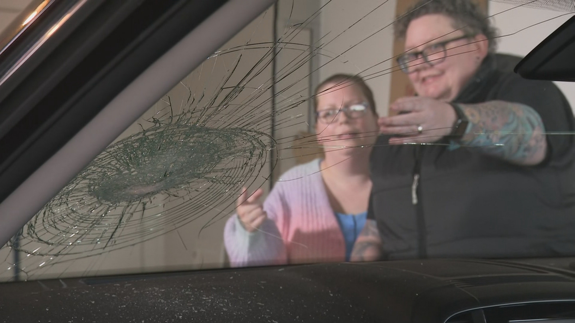 Rock thrown from bridge onto car windscreen
